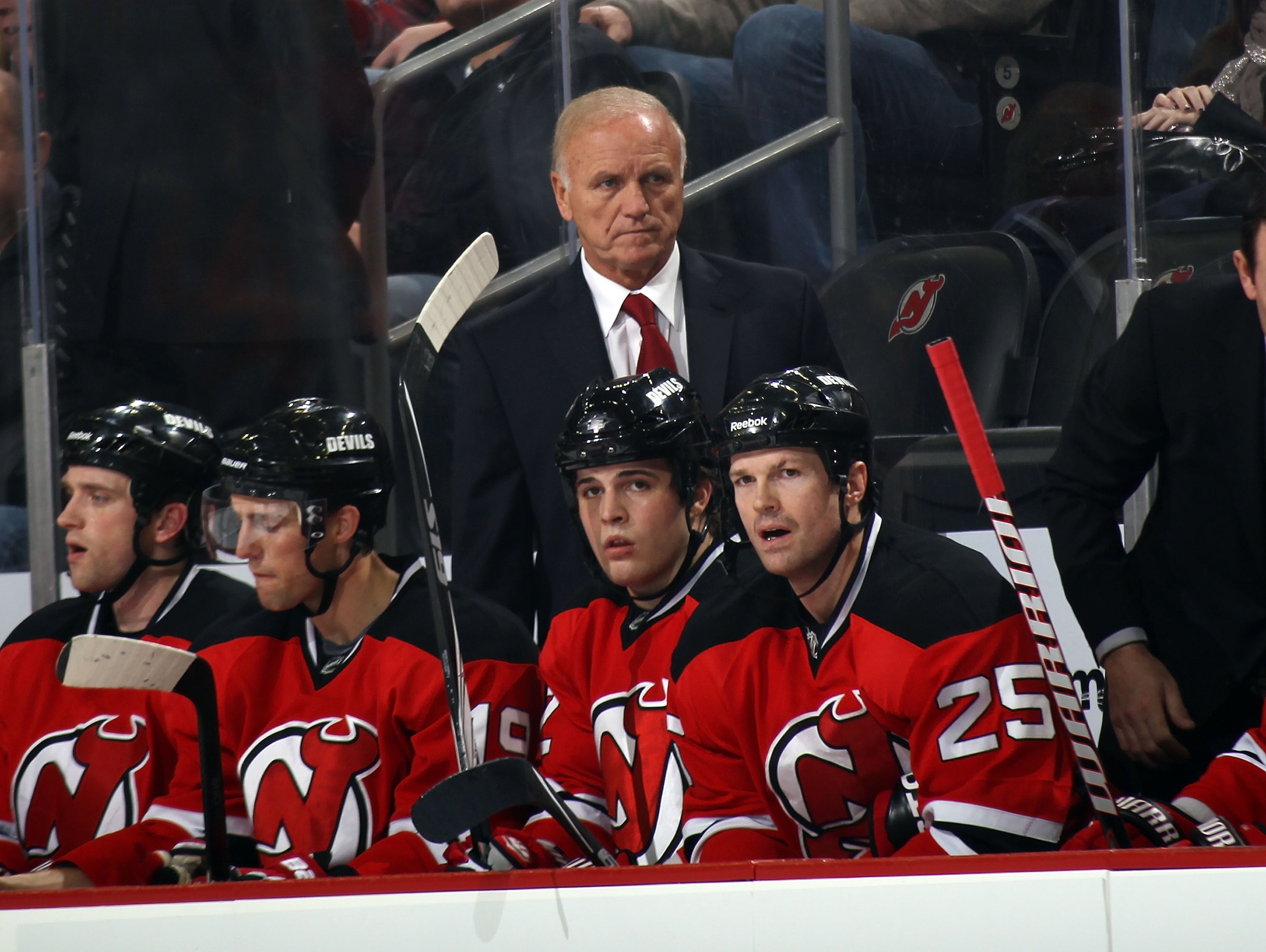 NEWARK, NJ - JANUARY 06:  Head coach Jacques Lemaire of the New Jersey Devils walks the bench during the game against the Philadelphia Flyers at the Prudential Center on January 6, 2011 in Newark, New Jersey. The Flyers defeated the Devils 4-2.  (Photo by