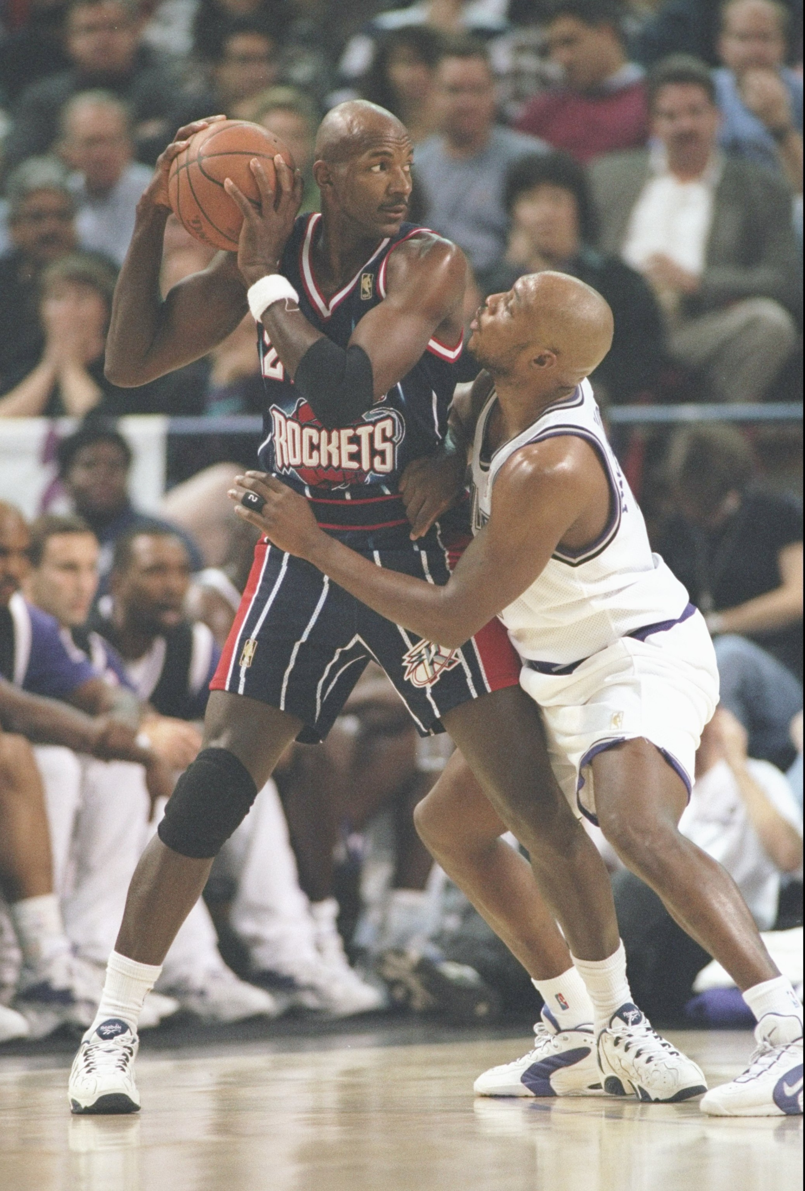 5 Nov 1996:  Guard Clyde Drexler of the Houston Rockets keeps the ball away from guard Mitch Richmond of the Sacramento Kings during a game at the ARCO Arena in Sacramento, California.  The Rockets won the game 102-80. Mandatory Credit: Otto Greule  /Alls
