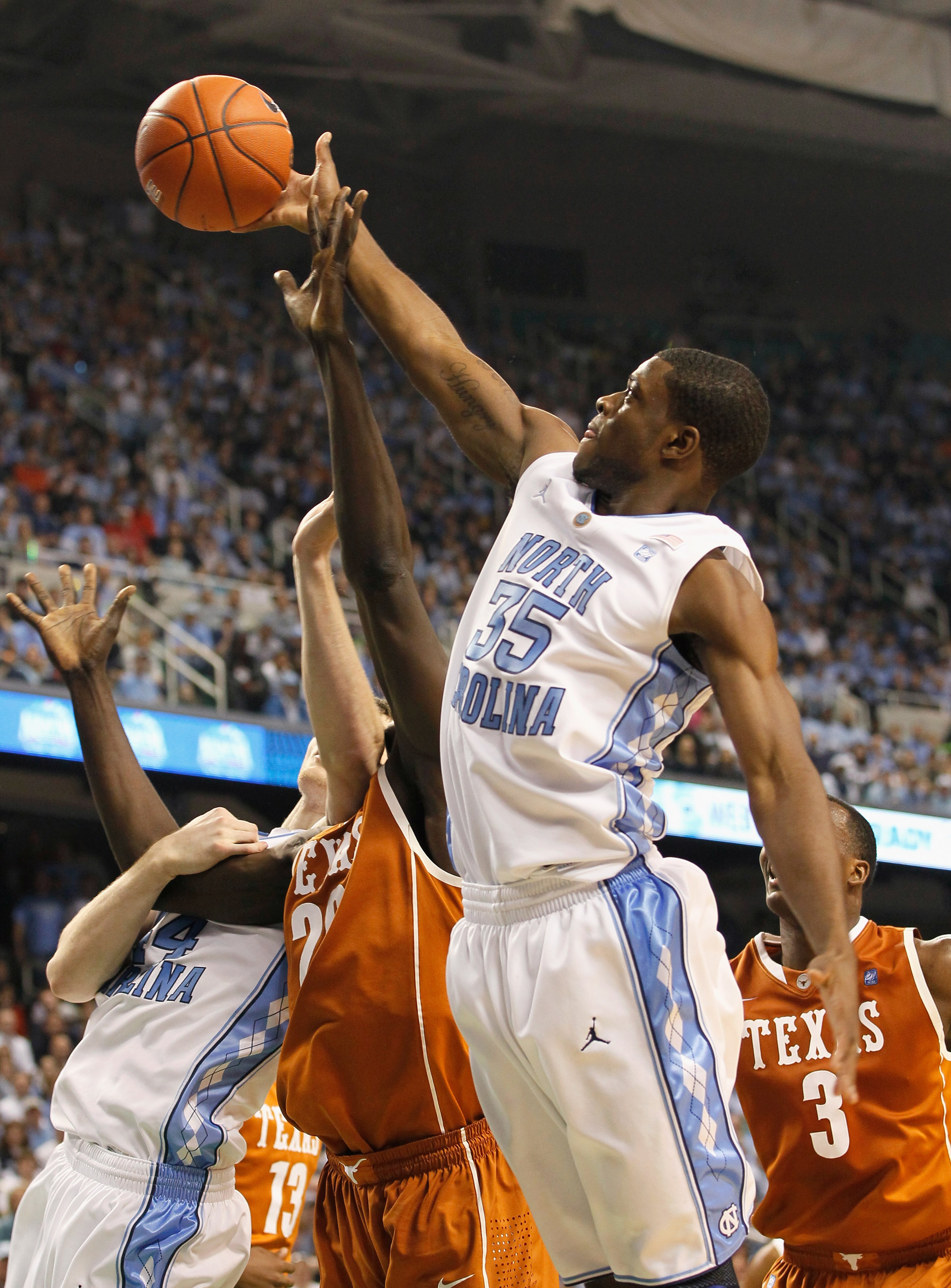 GREENSBORO, NC - DECEMBER 18: Reggie Bullock #35 of the North Carolina Tar Heels against the Texas Longhorns at Greensboro Coliseum on December 18, 2010 in Greensboro, North Carolina. (Photo by Kevin C. Cox/Getty Images) GREENSBORO, NC - DECEMBER 18: Reggie Bullock #35 of the North Carolina Tar Heels against the Texas Longhorns at Greensboro Coliseum on December 18, 2010 in Greensboro, North Carolina. (Photo by Kevin C. Cox/Getty Images)