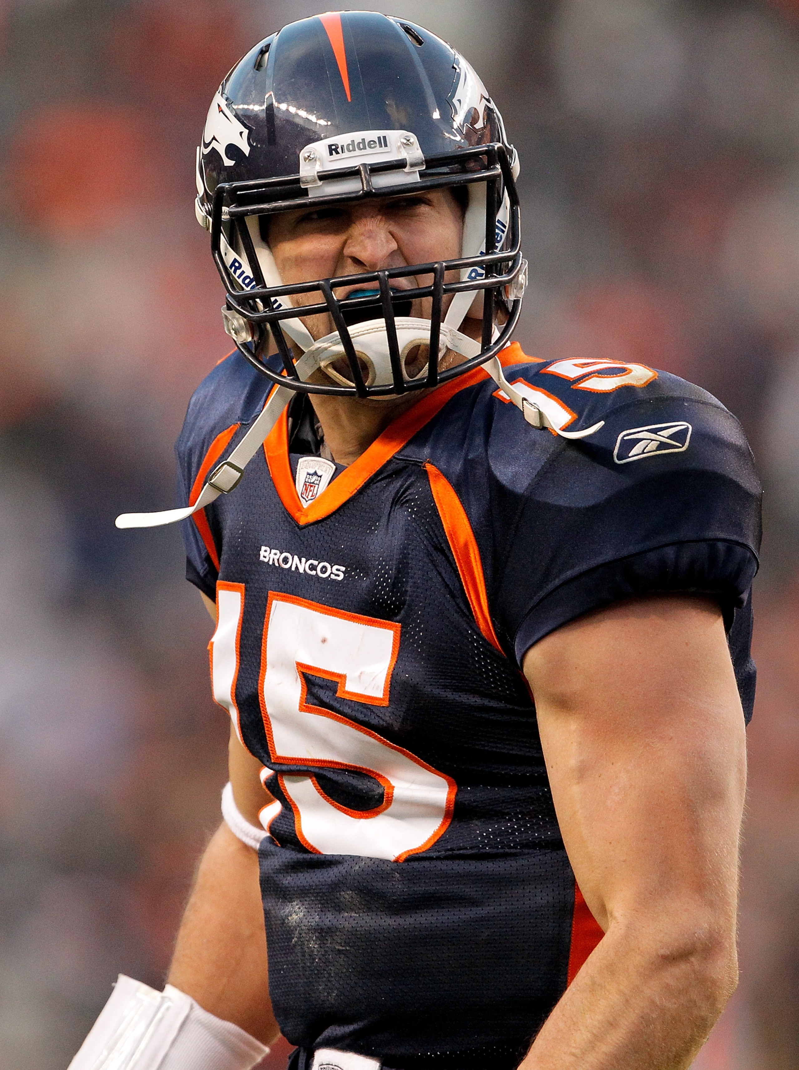 DENVER, CO - JANUARY 2:  Quarterback Tim Tebow #15 of the Denver Broncos celebrates a touchdown pass to Eric Decker during the third quarter against the San Diego Chargers at INVESCO Field at Mile High on January 2, 2011 in Denver, Colorado. (Photo by Jus