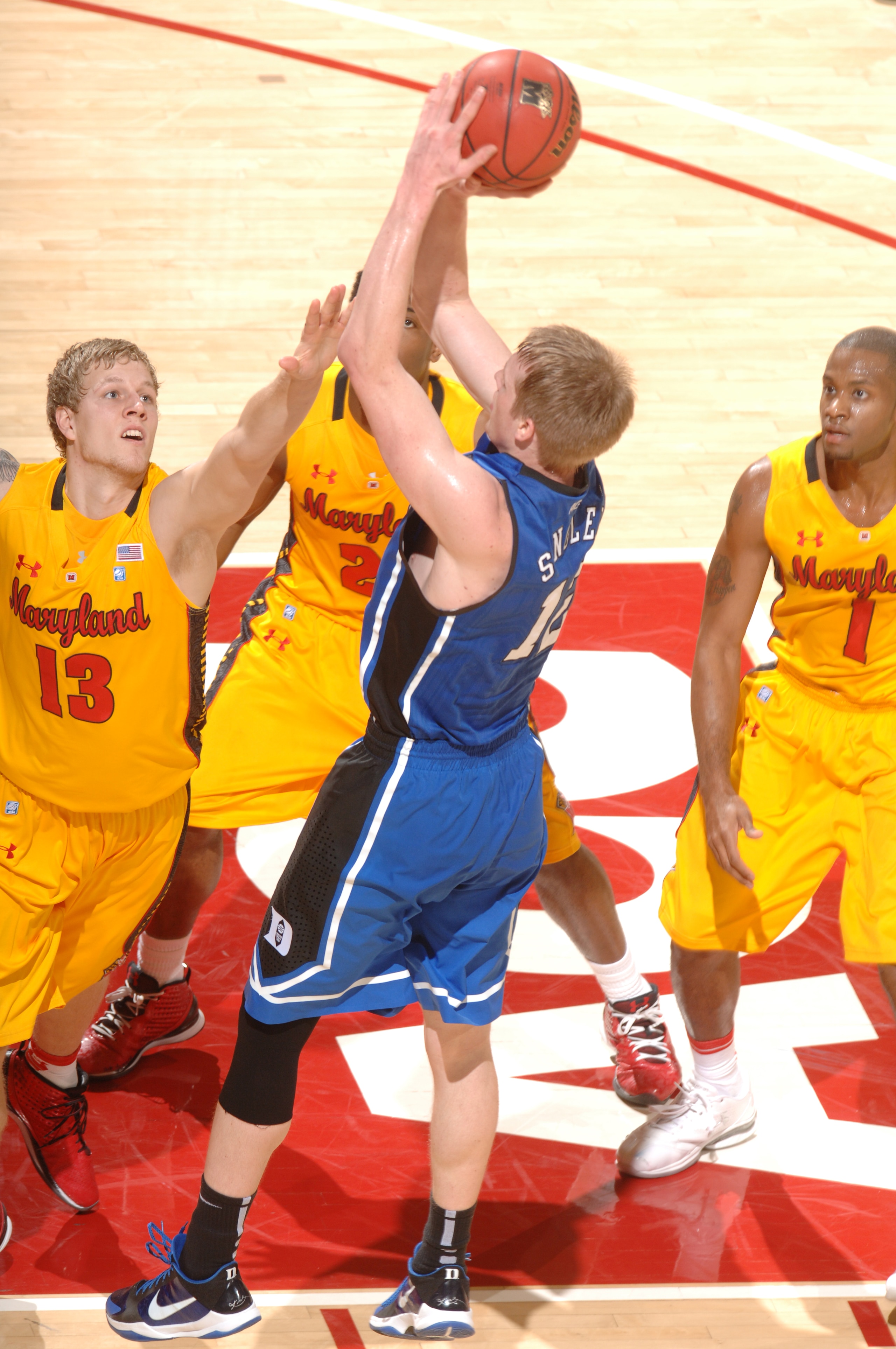 COLLEGE PARK, MD - FEBRUARY 2: Kyle Singler #12 of the Duke Blue Devils takes a jump shot during a college basketball game against the Maryland Terrapins on February 2, 2011 at the Comcast Arena in College Park, Maryland. The Blue Devils won 80-62. (Photo