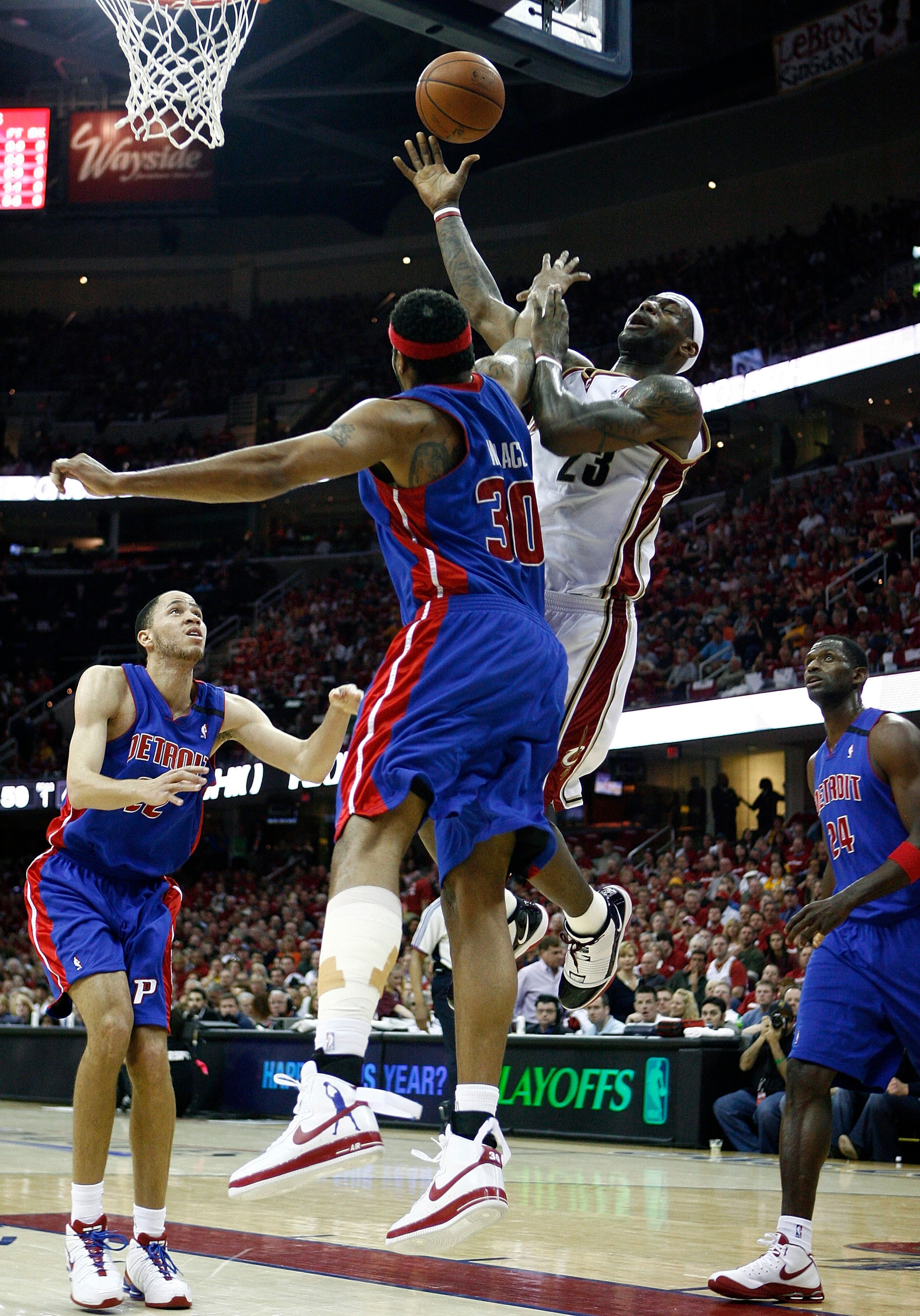 CLEVELAND - APRIL 18:  LeBron James #23 of the Cleveland Cavaliers shoots over Rasheed Wallace #30 of the Detroit Pistons during Game One of the Eastern Conference Quarterfinals during the 2009 NBA Playoffs at Quicken Loans Arena on April 18, 2009 in Clev