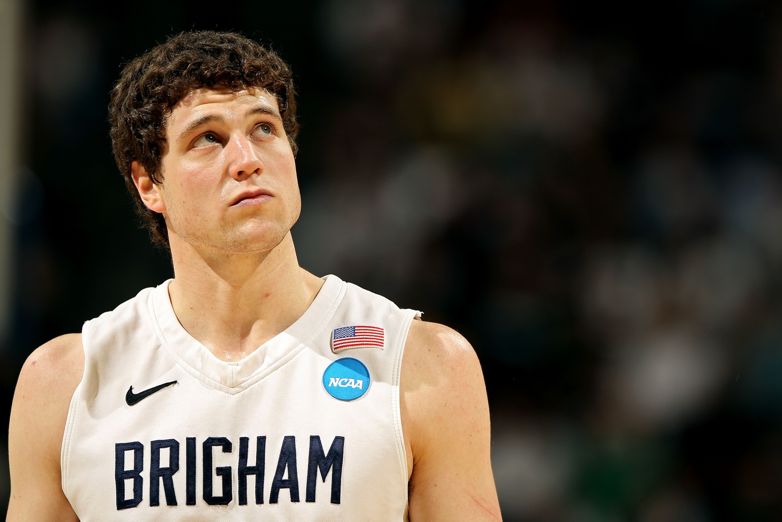 DENVER, CO - MARCH 19:  Jimmer Fredette #32 of the Brigham Young Cougars looks on against the Gonzaga Bulldogs during the third round of the 2011 NCAA men's basketball tournament at Pepsi Center on March 19, 2011 in Denver, Colorado.  (Photo by Doug Pensi