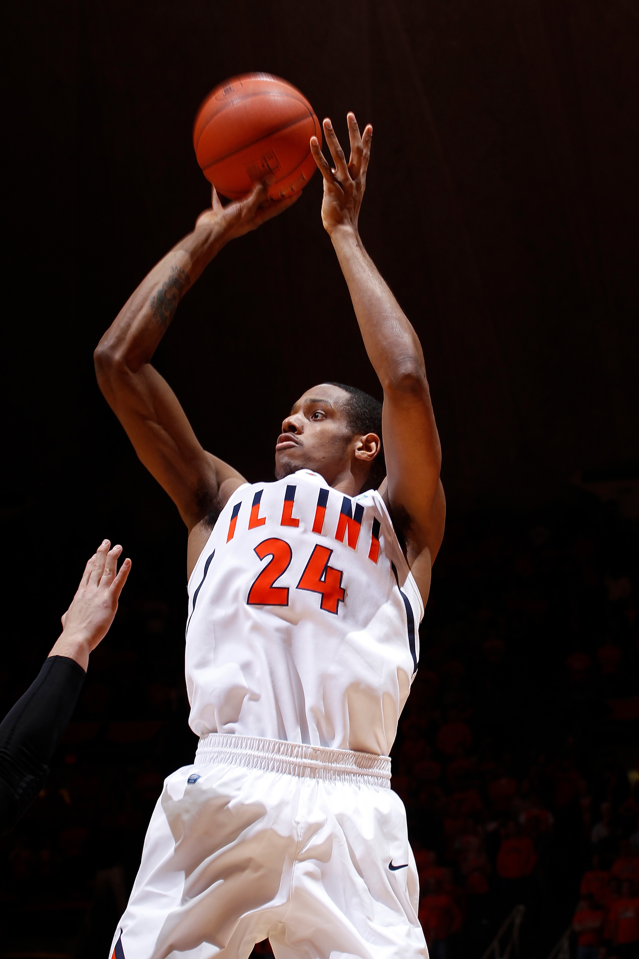 CHAMPAIGN, IL - FEBRUARY 13: Mike Davis #24 of the Illinois Fighting Illini takes a shot against the Purdue Boilermakers at Assembly Hall on February 13, 2011 in Champaign, Illinois. Purdue defeated Illinois 81-70. (Photo by Joe Robbins/Getty Images)