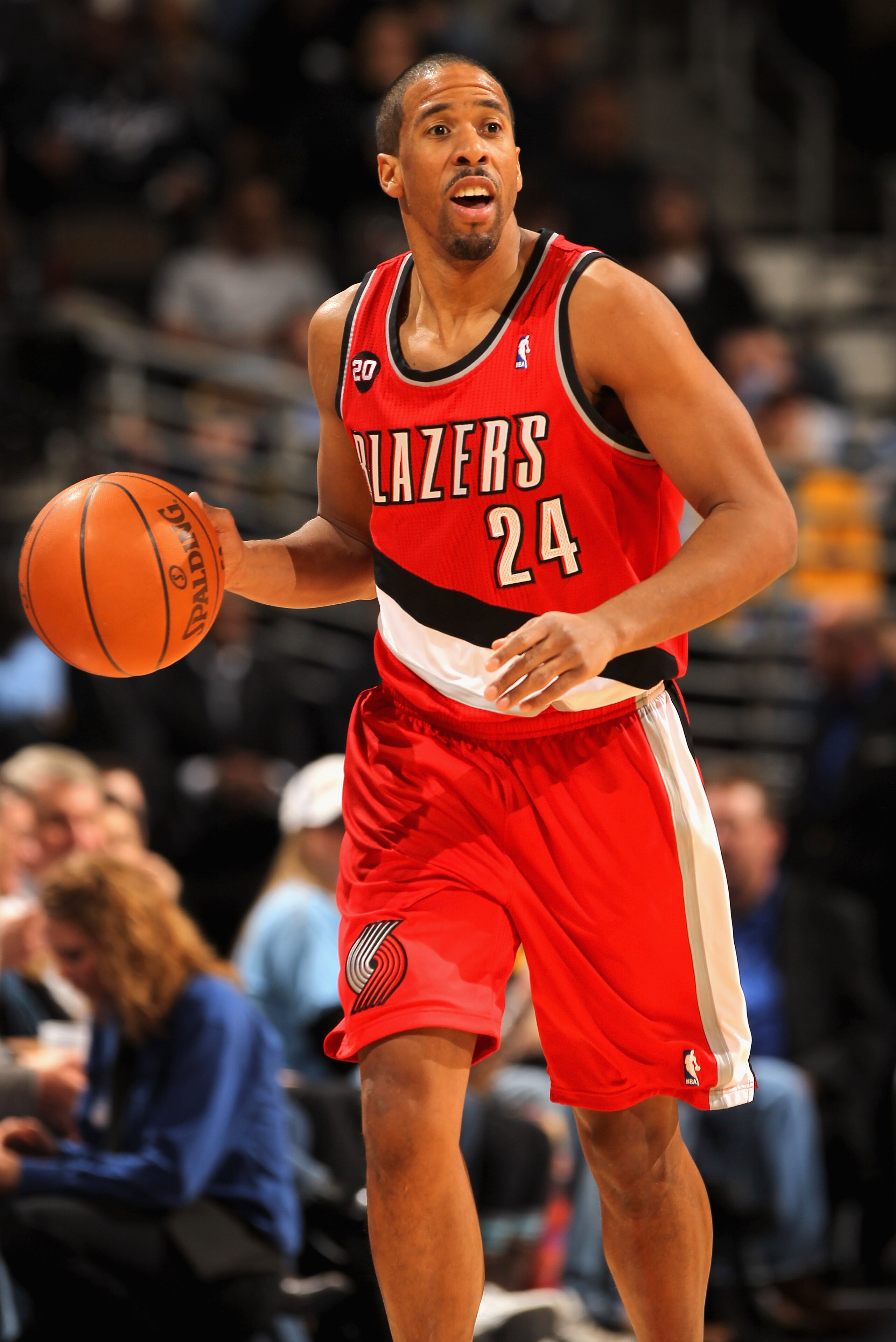 DENVER - DECEMBER 28:  Andre Miller #24 of the Portland Trail Blazers dribbles the ball against the Denver Nuggets at Pepsi Center on December 28, 2010 in Denver, Colorado. The Nuggets defeated the Blazers 95-77. NOTE TO USER: User expressly acknowledges