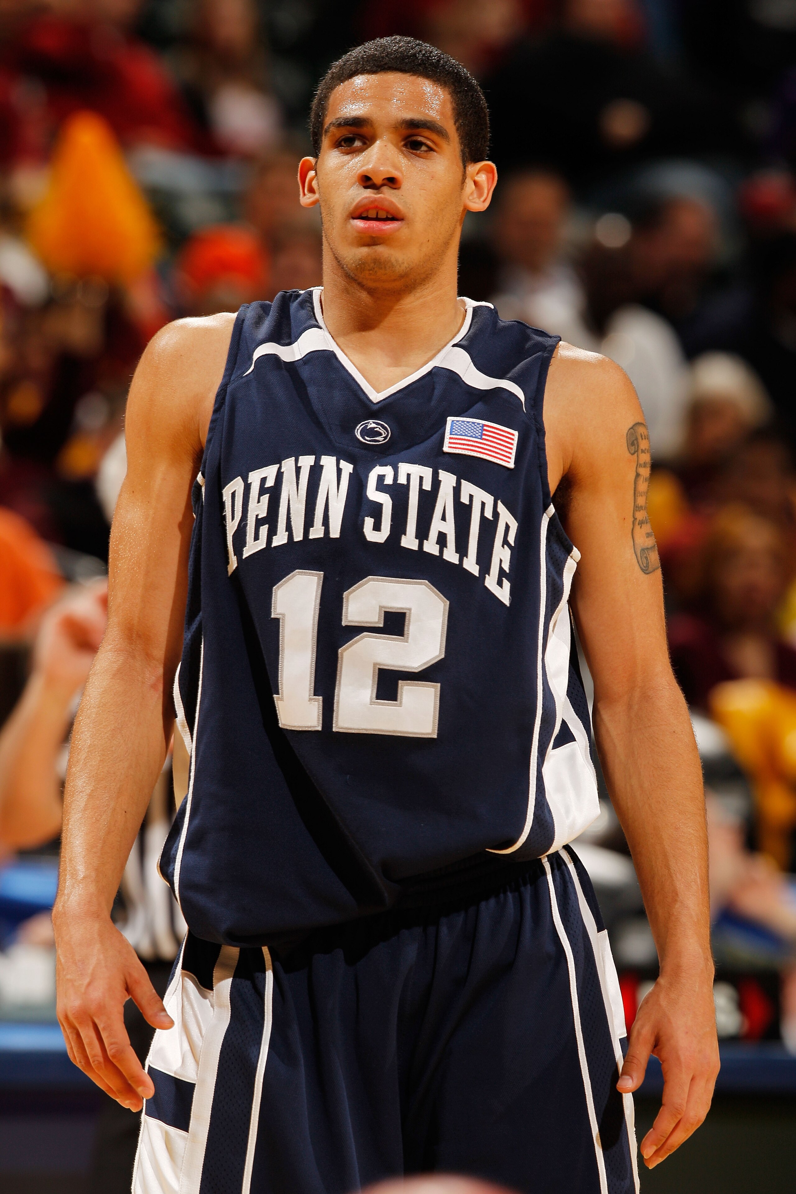 INDIANAPOLIS - MARCH 11:  Guard Talor Battle #12 of the Penn State Nittany Lion stands on the court during the game against the Minnesota Golden Gophers in the first round of the Big Ten Men's Basketball Tournament at Conseco Fieldhouse on March 11, 2010
