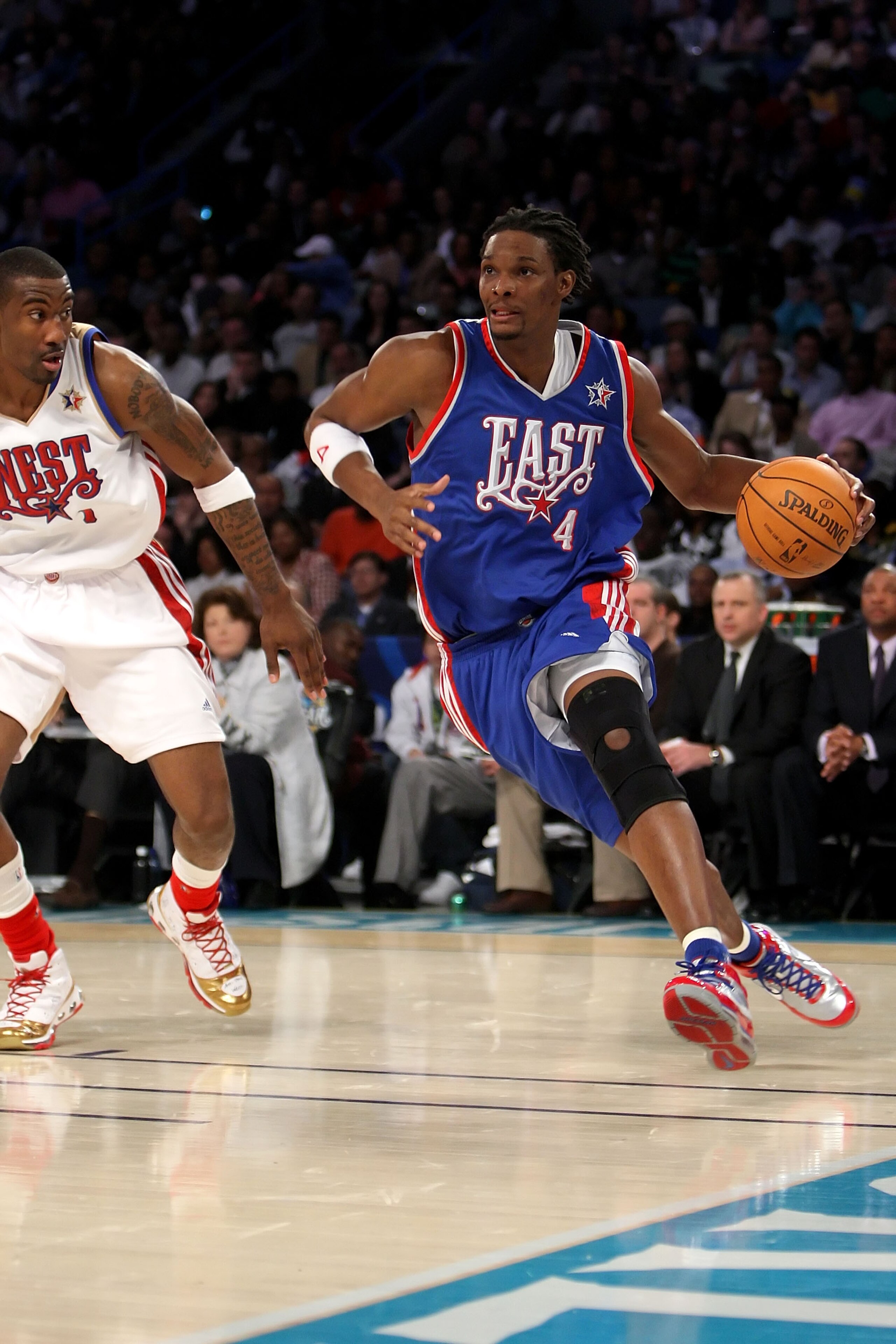 NEW ORLEANS - FEBRUARY 17:  Chris Bosh #4 of the Eastern Conference drives to the basket past Amare Stoudemire #1 of the Western Conference during the 57th NBA All-Star Game, part of 2008 NBA All-Star Weekend at the New Orleans Arena on February 17, 2008