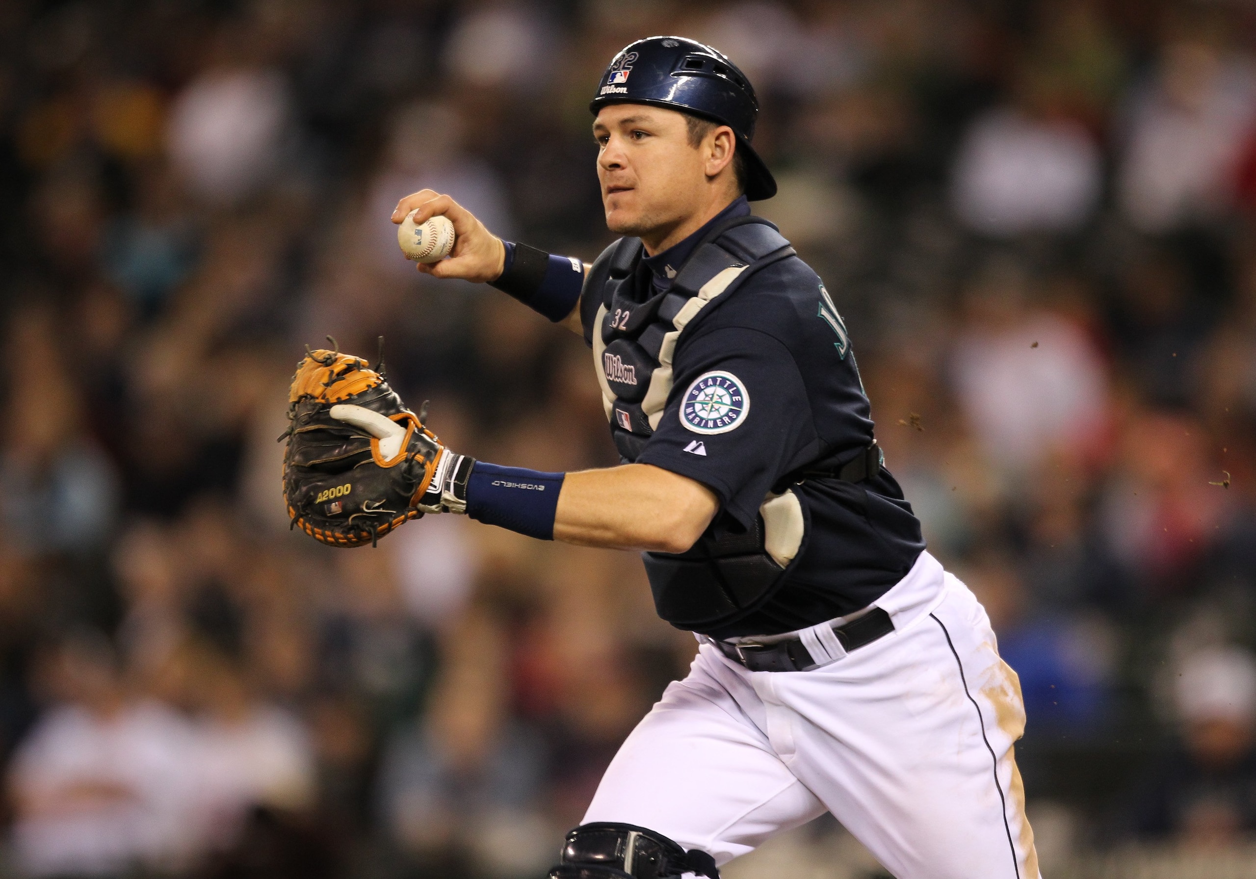 SEATTLE - MAY 31:  Catcher Rob Johnson #32 of the Seattle Mariners chases Justin Morneau of the Minnesota Twins in a pickle at Safeco Field on May 31, 2010 in Seattle, Washington. (Photo by Otto Greule Jr/Getty Images)