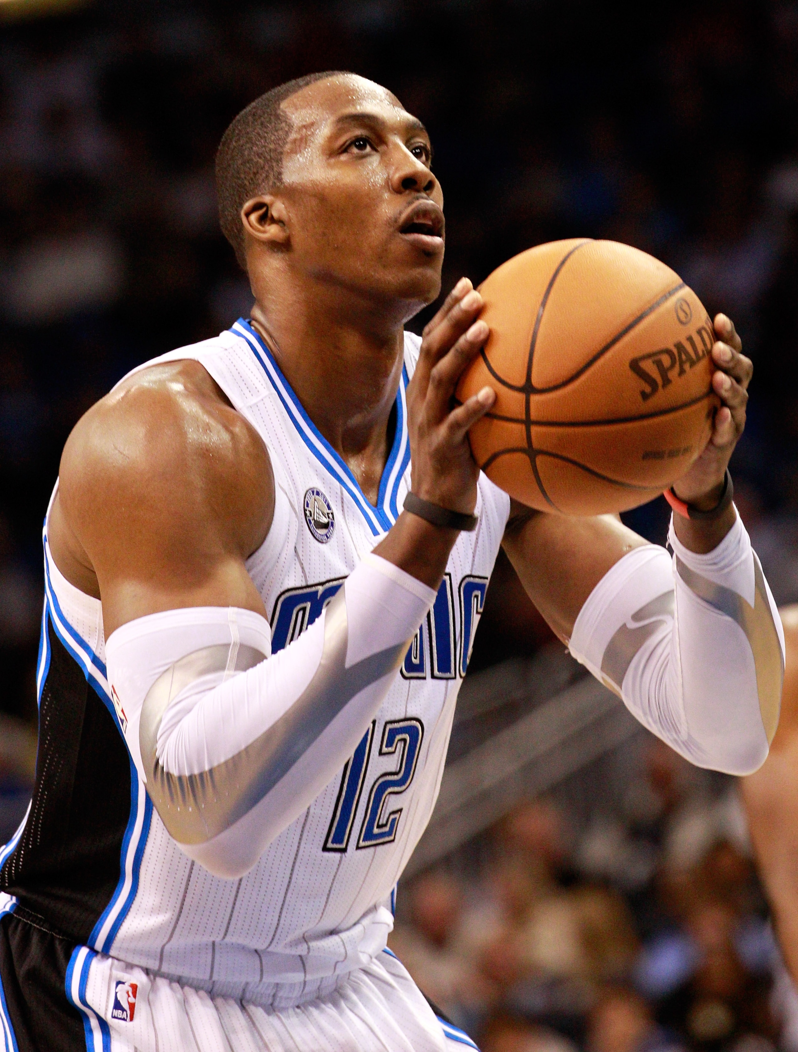 ORLANDO, FL - JANUARY 24:  Dwight Howard #12 of the Orlando Magic attempts a foul shot during the game against the Detroit Pistons at Amway Arena on January 24, 2011 in Orlando, Florida.  NOTE TO USER: User expressly acknowledges and agrees that, by downl