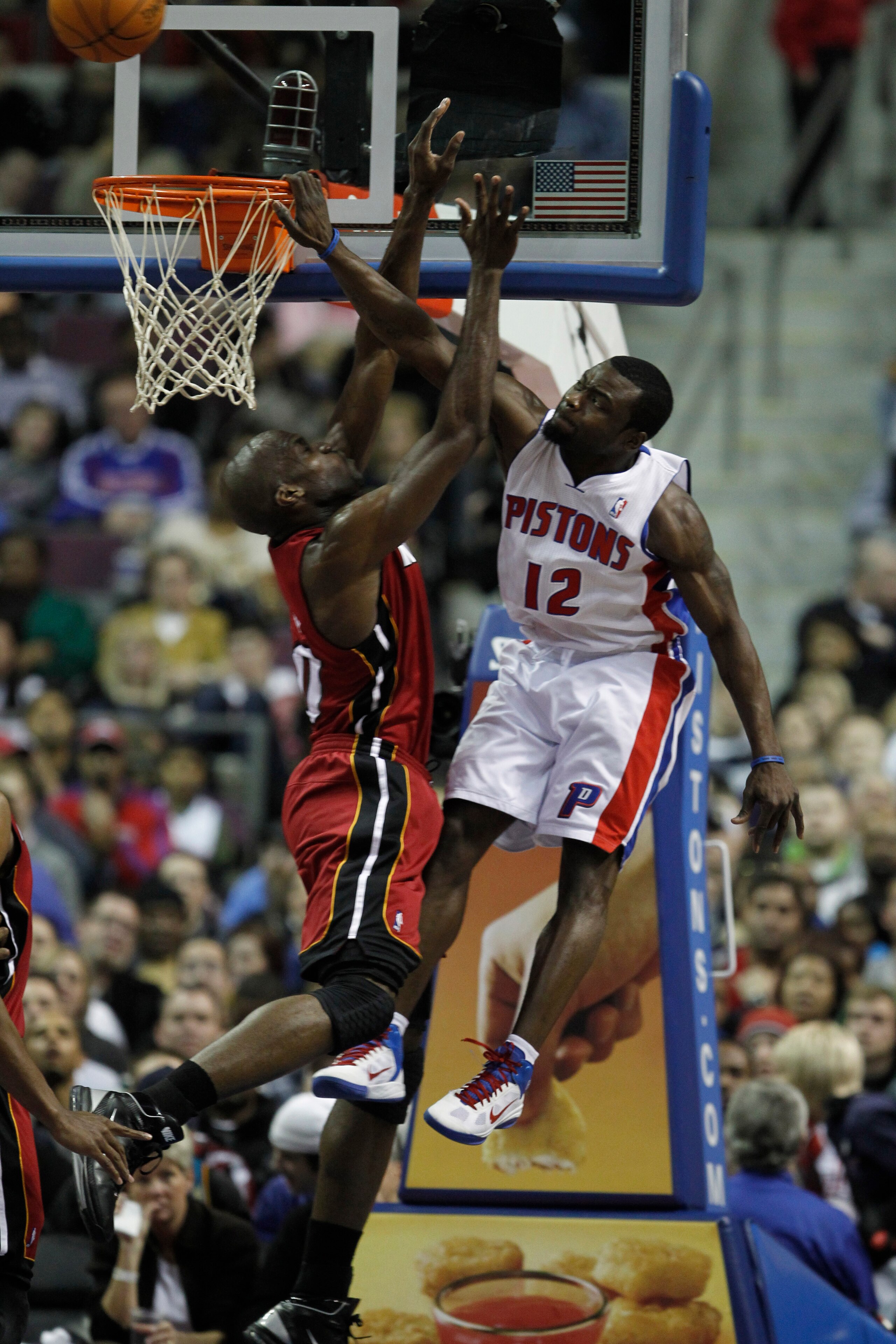 AUBURN HILLS, MI - FEBRUARY 11:  Will Bynum #12 of the Detroit Pistons tries to dunk over Joel Anthony #50 of the Miami Heat at The Palace of Auburn Hills on February 11, 2011 in Auburn Hills, Michigan.  (Photo by Gregory Shamus/Getty Images)