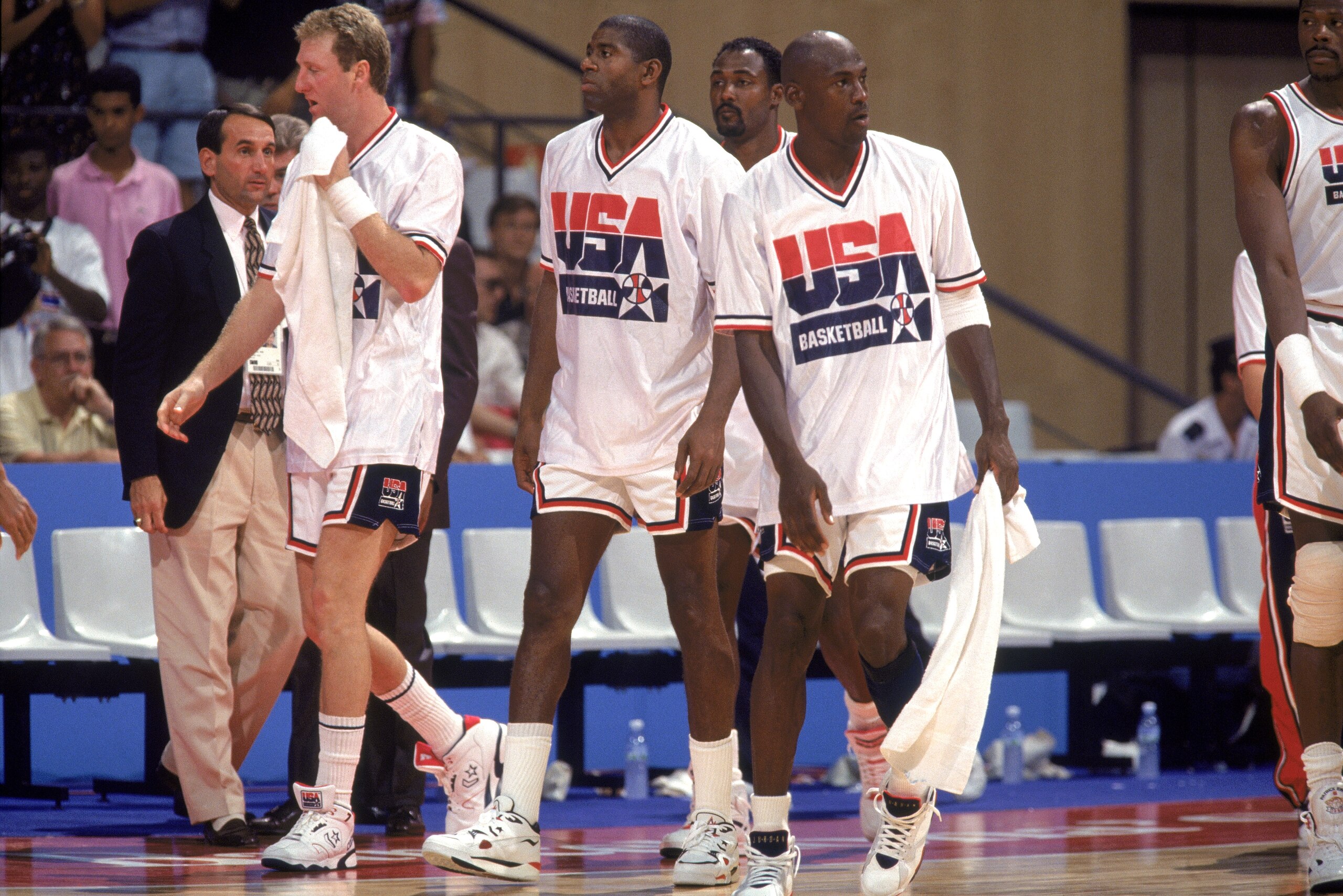 BARCELONA, ESP - JULY 26: (L-R) Larry Bird, Earvin (Magic) Johnson, Michael Jordan and Karl Malone of the USA Olympic Basketball Team (The Dream Team) walk on the court during a game against The Republic of Angola Olympic Team on July 26,1992 in Barcelona BARCELONA, ESP - JULY 26: (L-R) Larry Bird, Earvin (Magic) Johnson, Michael Jordan and Karl Malone of the USA Olympic Basketball Team (The Dream Team) walk on the court during a game against The Republic of Angola Olympic Team on July 26,1992 in Barcelona