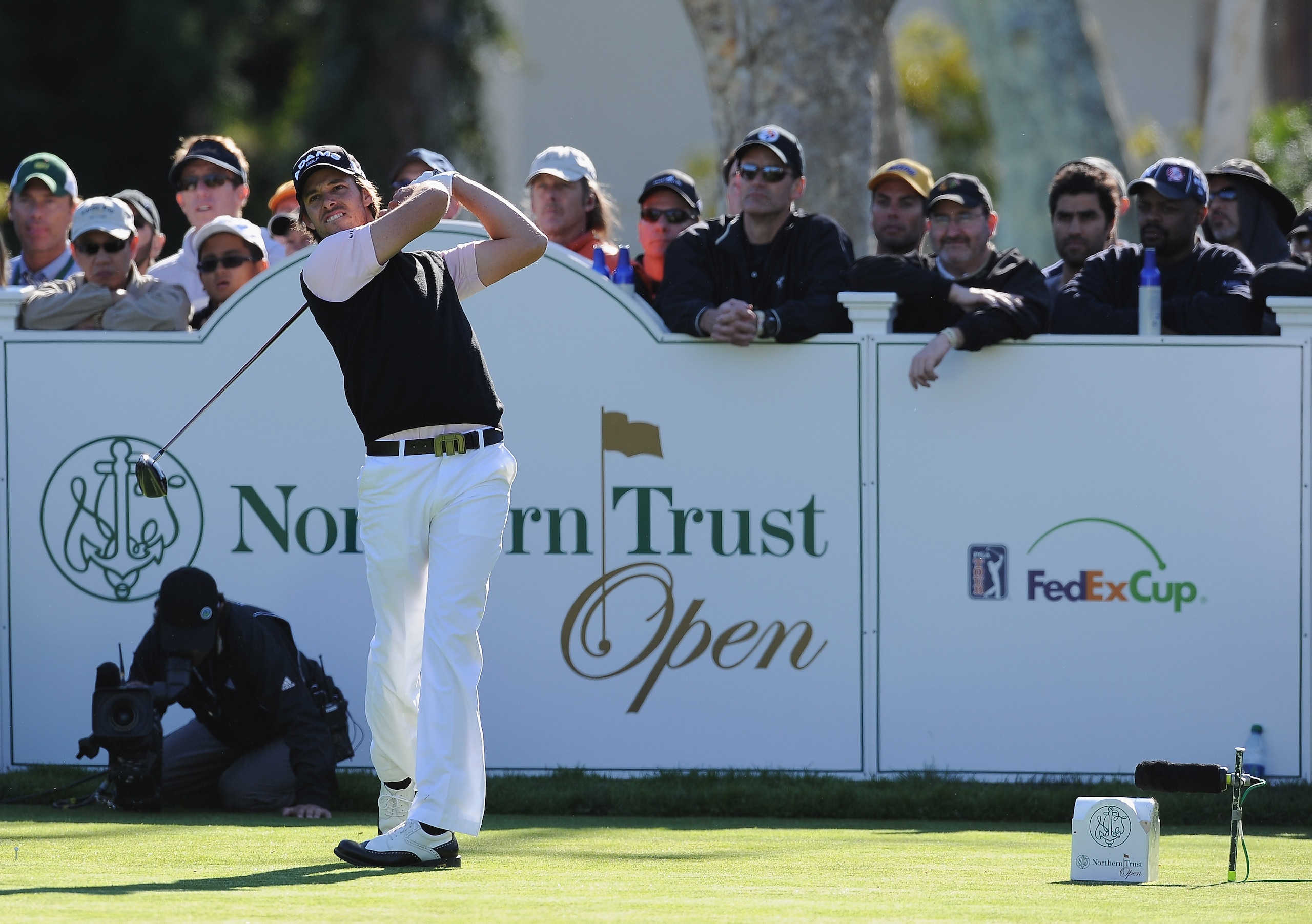 PACIFIC PALISADES, CA - FEBRUARY 20: Aaron Baddeley of Australia plays his tee shot on the 17th hole during the final round of the Northern Trust Open at Riviera Country Club on February 20, 2011 in Pacific Palisades, California. (Photo by Stuart Frankl PACIFIC PALISADES, CA - FEBRUARY 20: Aaron Baddeley of Australia plays his tee shot on the 17th hole during the final round of the Northern Trust Open at Riviera Country Club on February 20, 2011 in Pacific Palisades, California. (Photo by Stuart Frankl