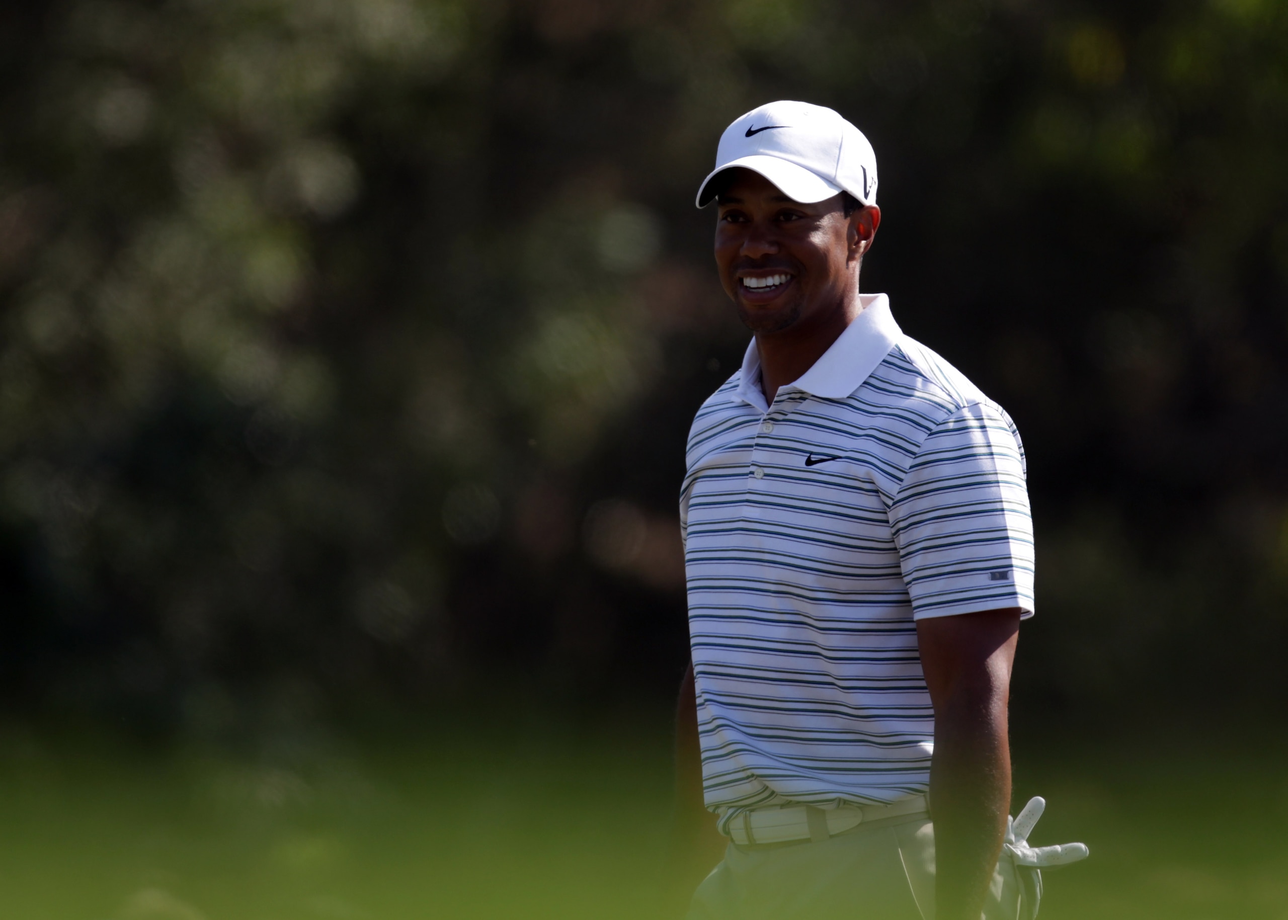 DUBAI, UNITED ARAB EMIRATES - FEBRUARY 12:  Tiger Woods of the USA during the third round of the Omega Dubai Desert Classic on the Majlis course at the Emirates Golf Club on February 12, 2011 in Dubai, United Arab Emirates.  (Photo by Ross Kinnaird/Getty