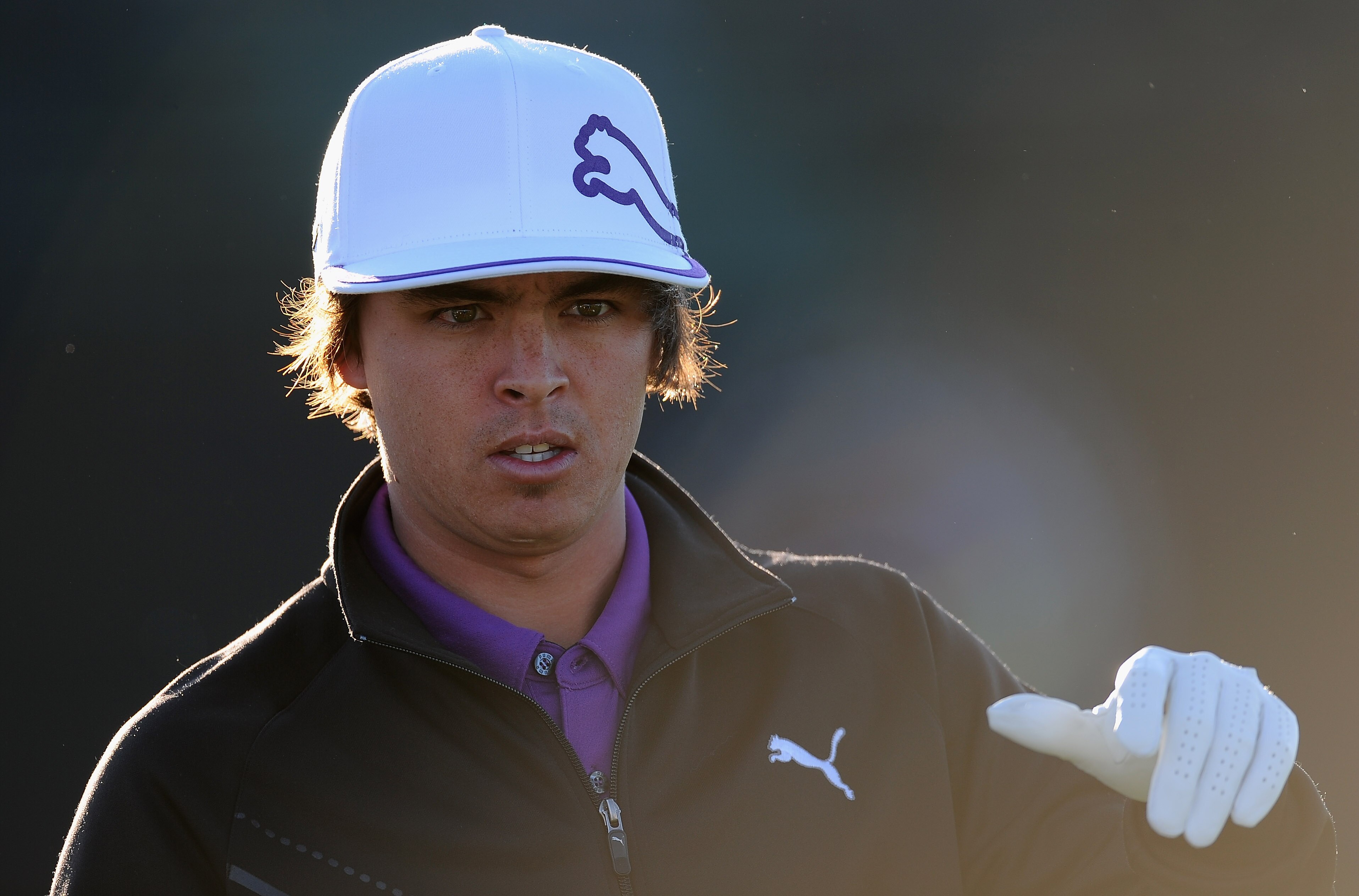 MARANA, AZ - FEBRUARY 22:  Rickie Fowler ponders during practice prior to the start of the World Golf Championships-Accenture Match Play Championship held at The Ritz-Carlton Golf Club, Dove Mountain on February 22, 2011 in Marana, Arizona.  (Photo by Stu