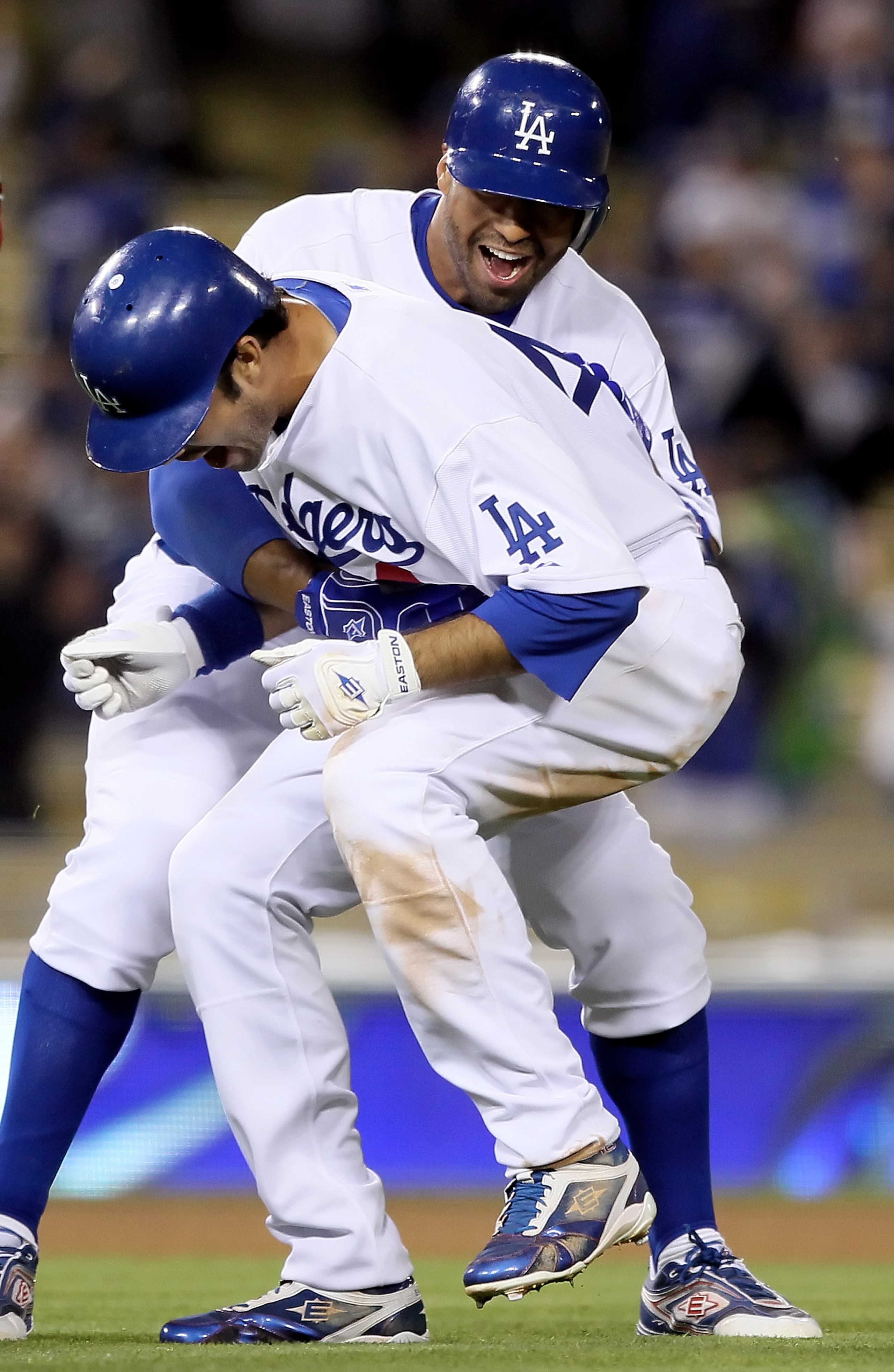 LOS ANGELES, CA - APRIL 15:  Andre Ethier (L) of the Los Angeles Dodgers is congratulated by teammate Matt Kemp after driving in the game winning run in the eleventh inning against the Arizona Diamondbacks at Dodger Stadium on April 15, 2010 in Los Angele