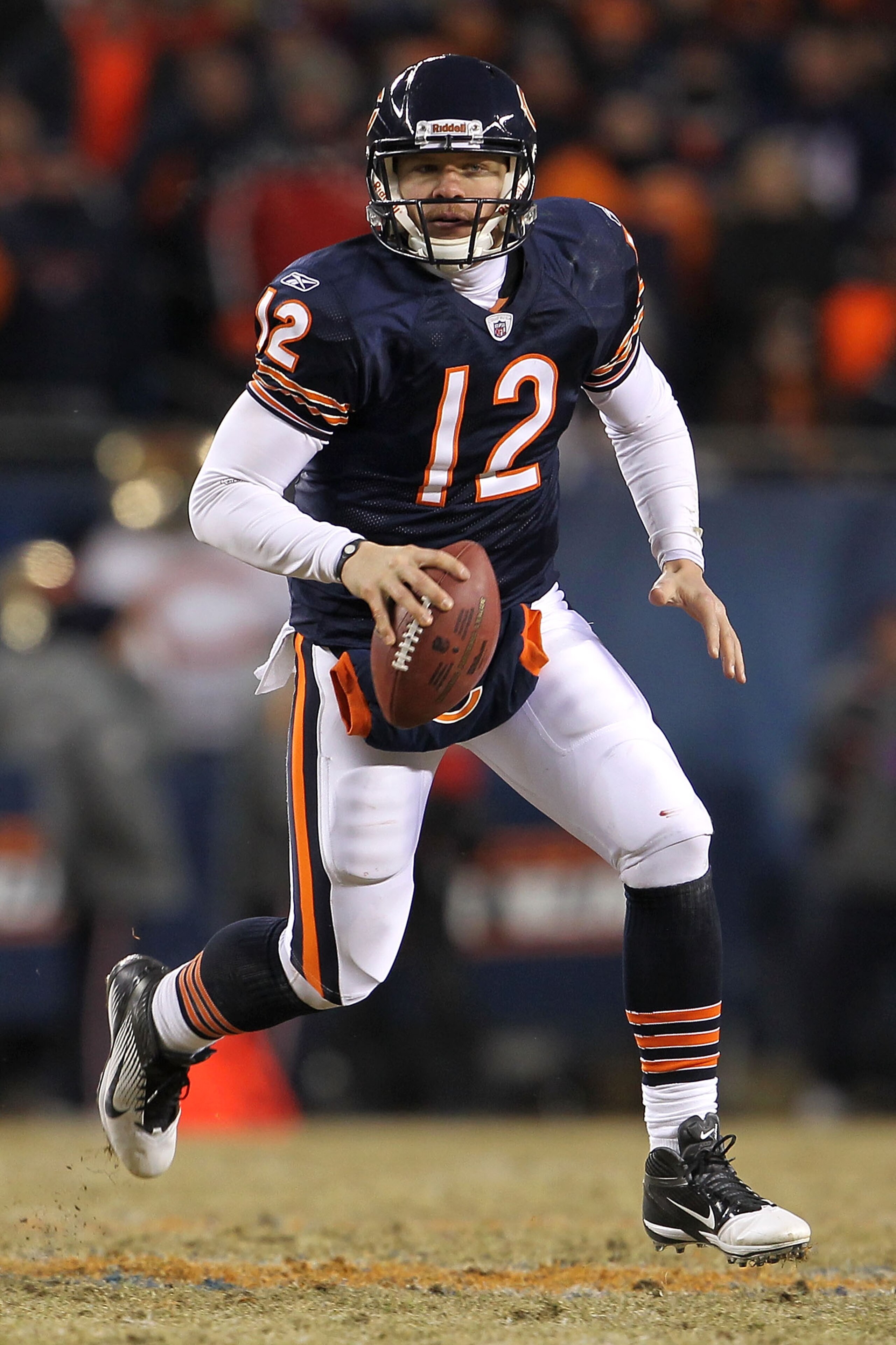 CHICAGO, IL - JANUARY 23:  Caleb Hanie #12 of the Chicago Bears looks to pass against the Green Bay Packers in the second half in the NFC Championship Game at Soldier Field on January 23, 2011 in Chicago, Illinois.  (Photo by Jamie Squire/Getty Images)