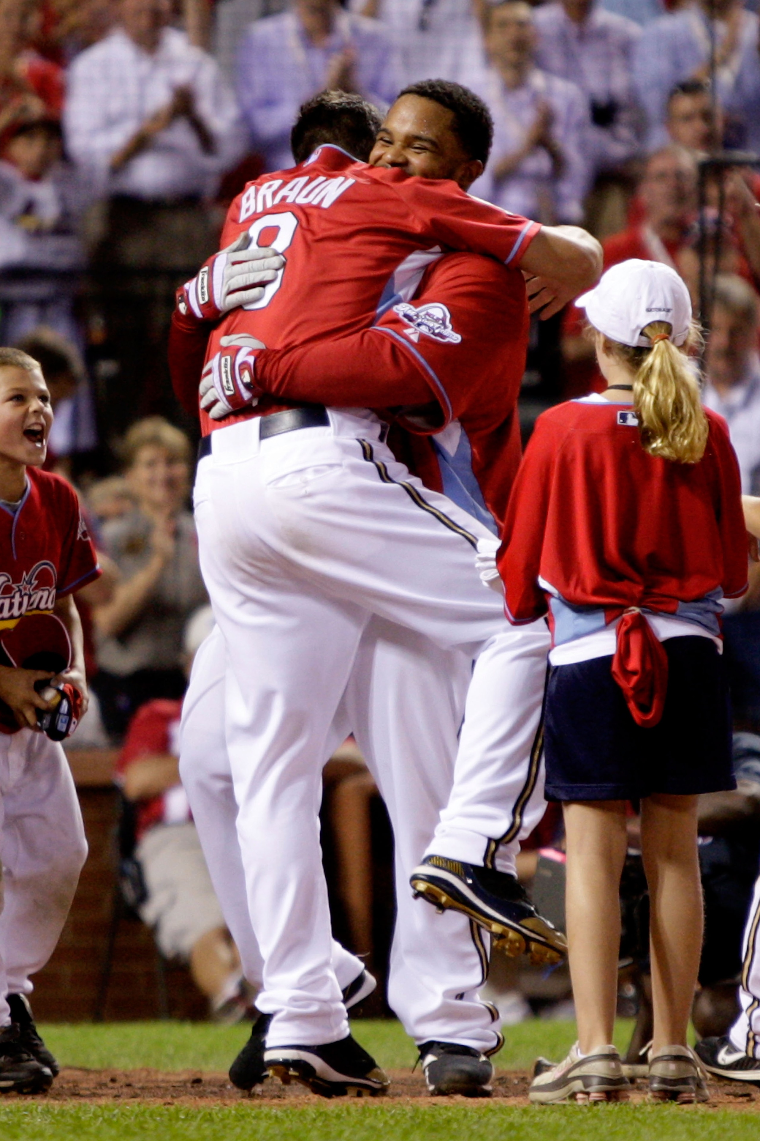 ST LOUIS, MO - JULY 13:  National League All-Star Prince Fielder of the Milwaukee Brewers celebrates with teammate Ryan Braun after winning the State Farm Home Run Derby at Busch Stadium on July 13, 2009 in St. Louis, Missouri.  (Photo by Jamie Squire/Get