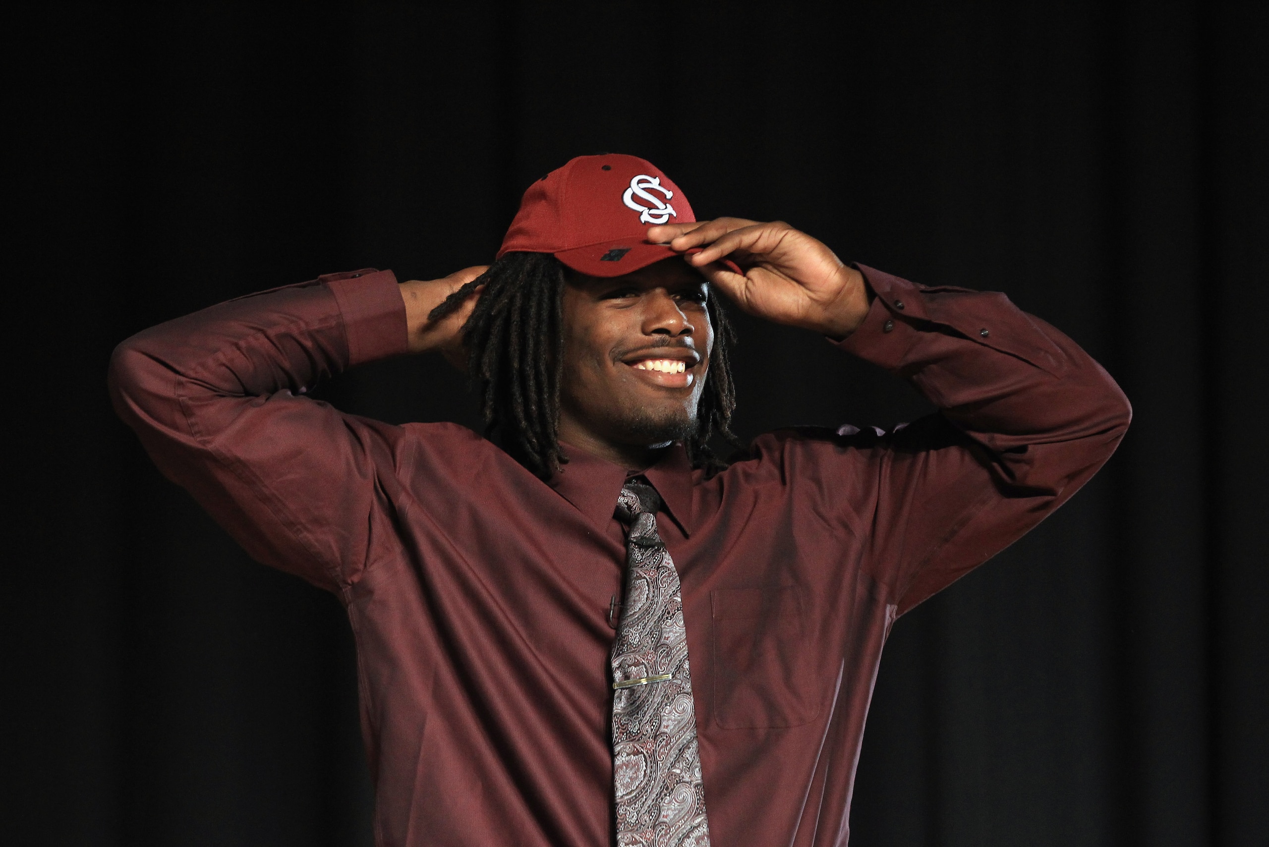 ROCK HILL, SC - FEBRUARY 14: Jadeveon Clowney announces his college football commitment to the University of South Carolina Gamecocks during a press conference at South Pointe High School on February 14, 2011 in Rock Hill, South Carolina. (Photo by Stre ROCK HILL, SC - FEBRUARY 14: Jadeveon Clowney announces his college football commitment to the University of South Carolina Gamecocks during a press conference at South Pointe High School on February 14, 2011 in Rock Hill, South Carolina. (Photo by Stre