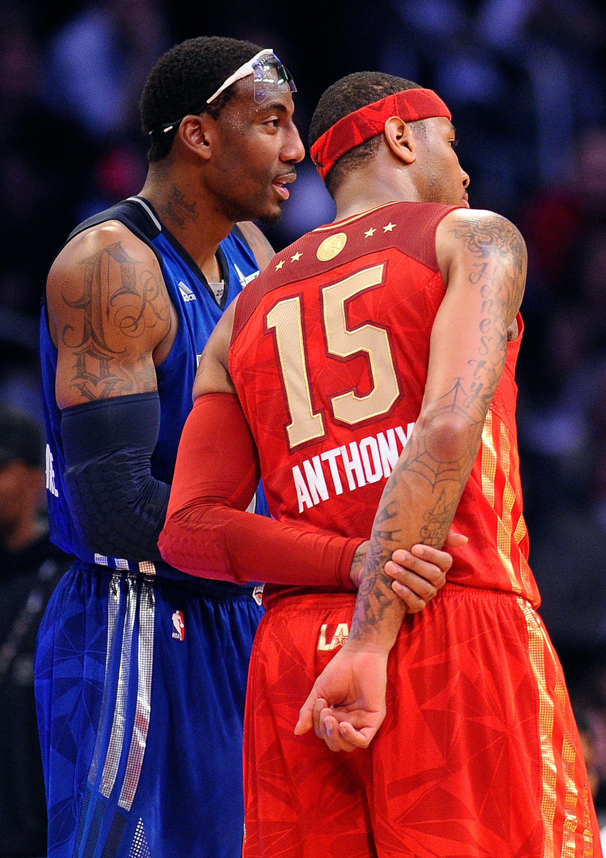 LOS ANGELES, CA - FEBRUARY 20:  Amare Stoudemire #1 of the New York Knicks and the Eastern Conference talks with Carmelo Anthony #15 of the Denver Nuggets and the Western Conference in the first half of the 2011 NBA All-Star Game at Staples Center on Febr