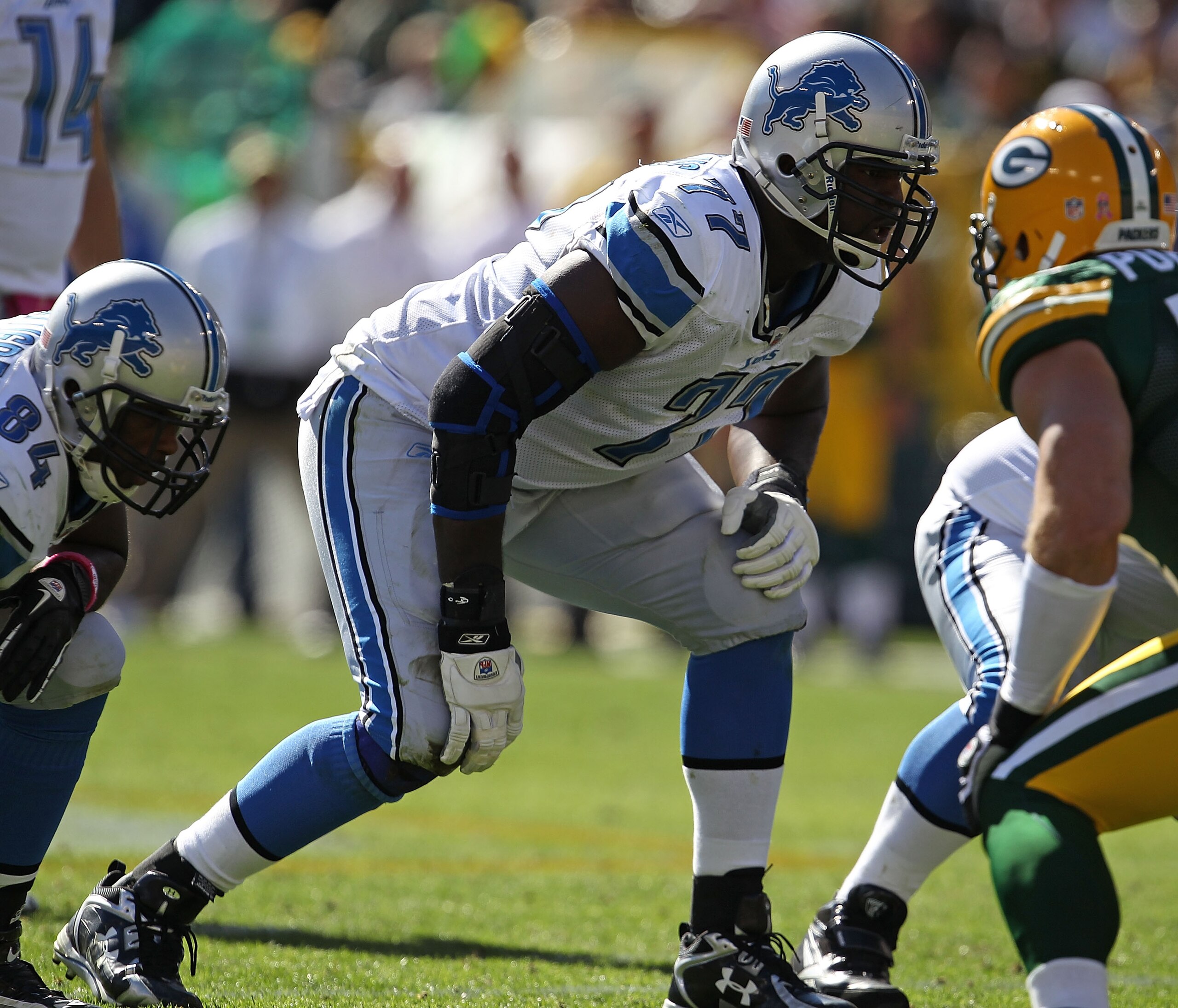 GREEN BAY, WI - OCTOBER 03: Gosder Cherilus #77 of the Detroit Lions awaits the start of play against the Green Bay Packers at Lambeau Field on October 3, 2010 in Green Bay, Wisconsin. The Packers defeated the Lions 28-26. (Photo by Jonathan Daniel/Getty