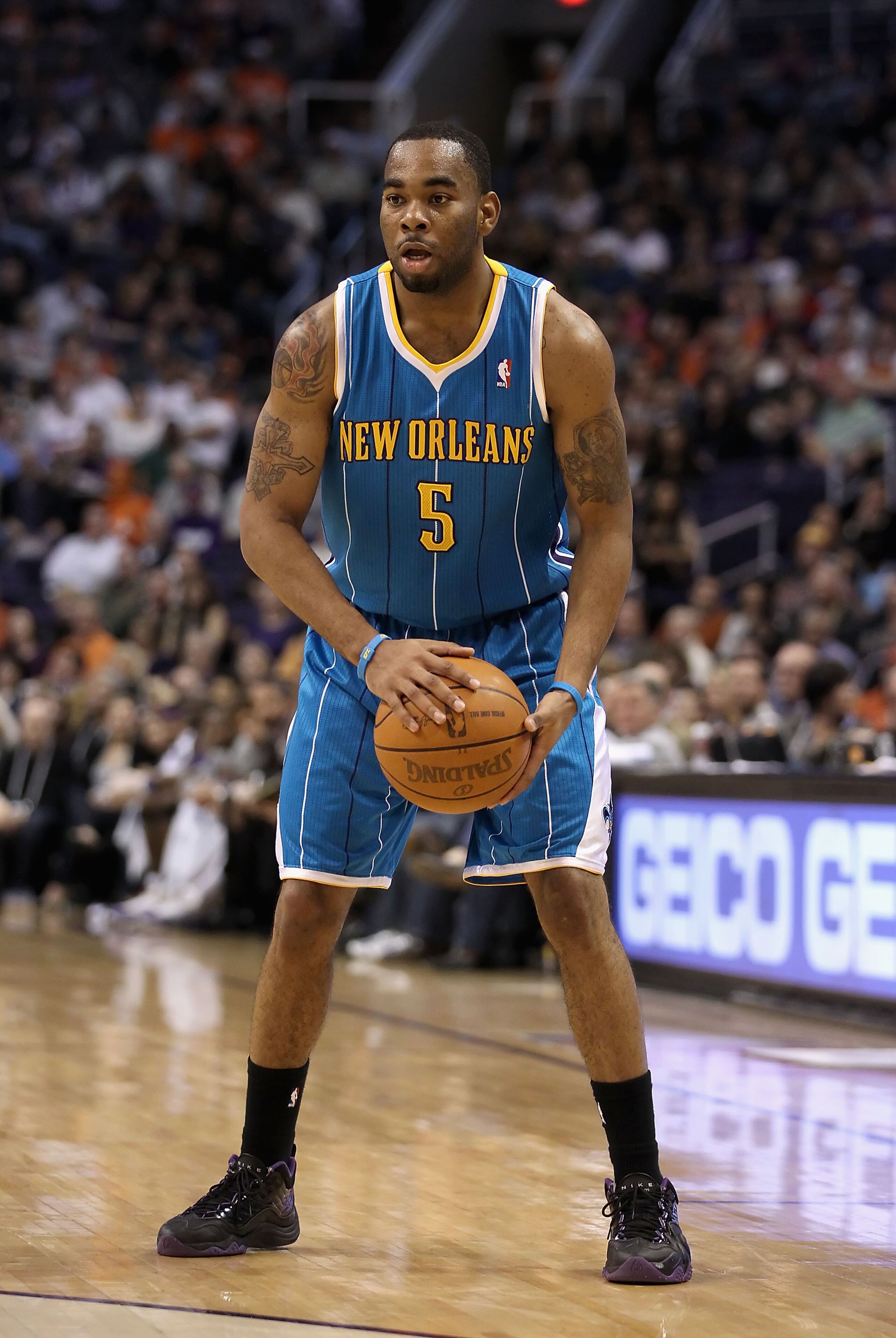 PHOENIX, AZ - JANUARY 30:  Marcus Thornton #5 of the New Orleans Hornets handles the ball during the NBA game against  the Phoenix Suns at US Airways Center on January 30, 2011 in Phoenix, Arizona.  The Suns defeated the Hornets 104-102. NOTE TO USER: Use