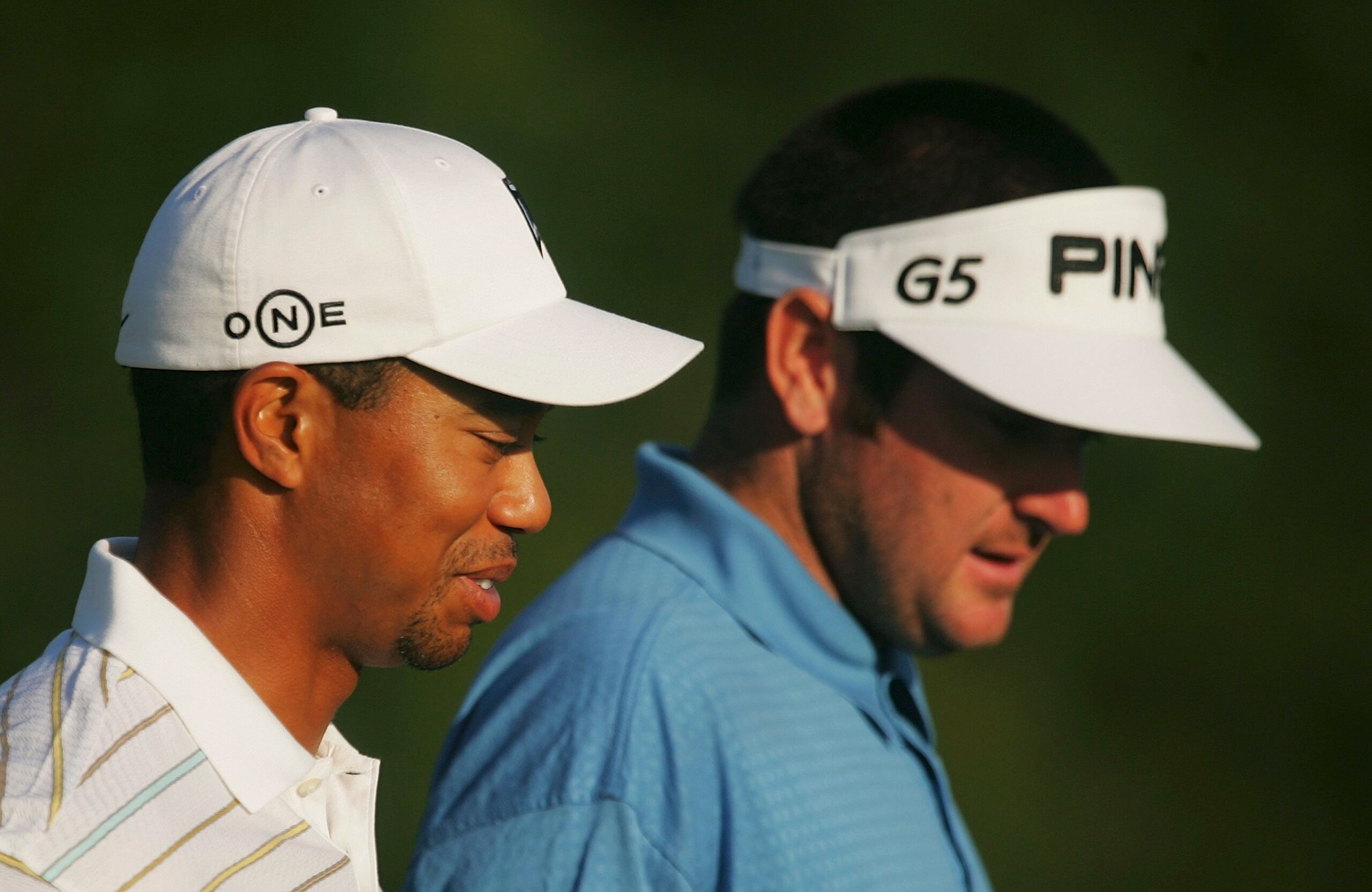 OAKMONT, PA - JUNE 11:  Tiger Woods of the USA and Bubba Watson of the USa walk down the tenth fairway during a practice round prior to the start of 107th U.S. Open Championship at Oakmont Country Club on June 11, 2007 in Oakmont, Pennsylvania.  (Photo by