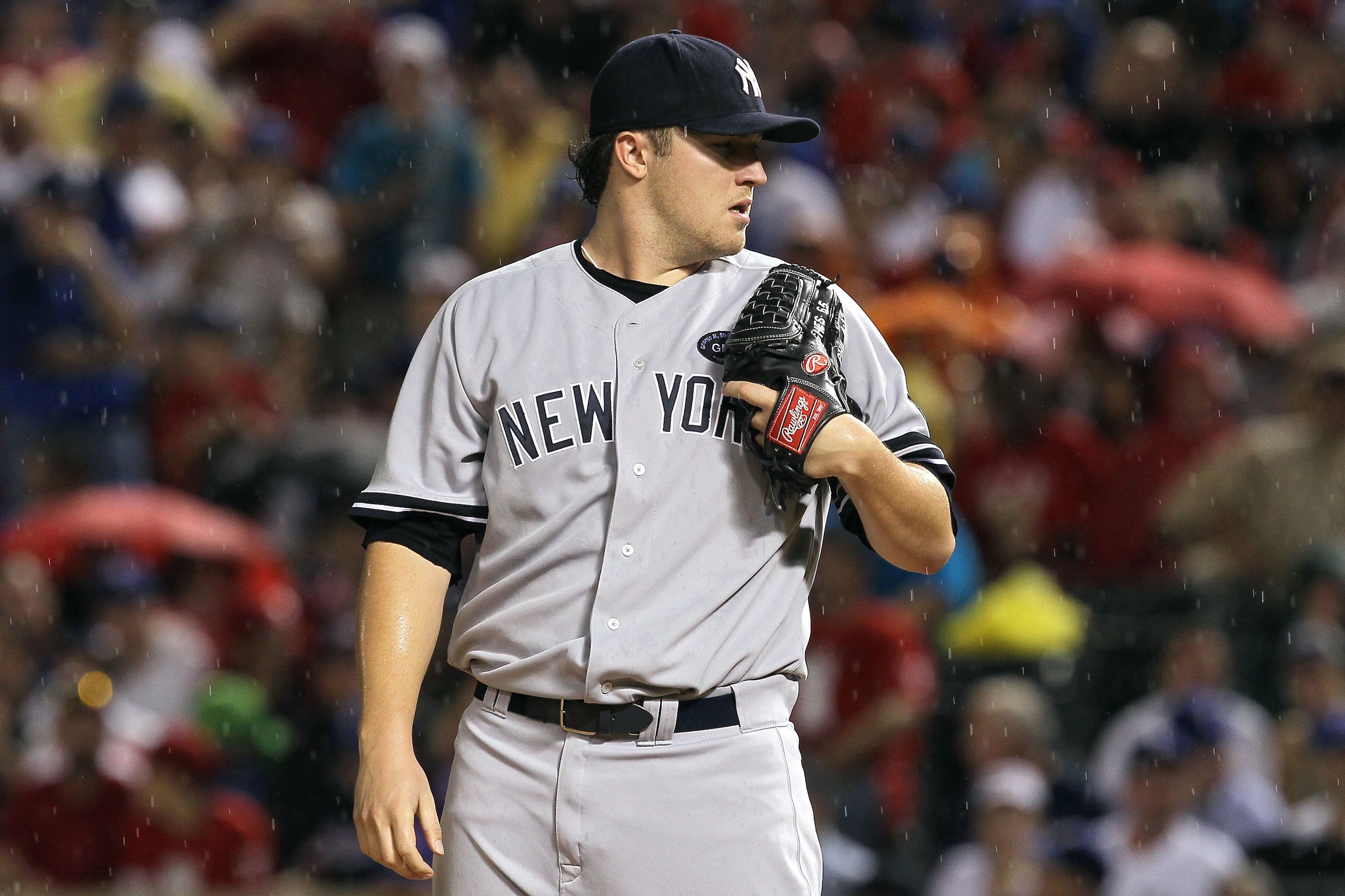 ARLINGTON, TX - OCTOBER 22:  Phil Hughes #65 of the New York Yankees stands on the mound during Game Six of the ALCS against the New York Yankees during the 2010 MLB Playoffs at Rangers Ballpark in Arlington on October 22, 2010 in Arlington, Texas.  (Phot