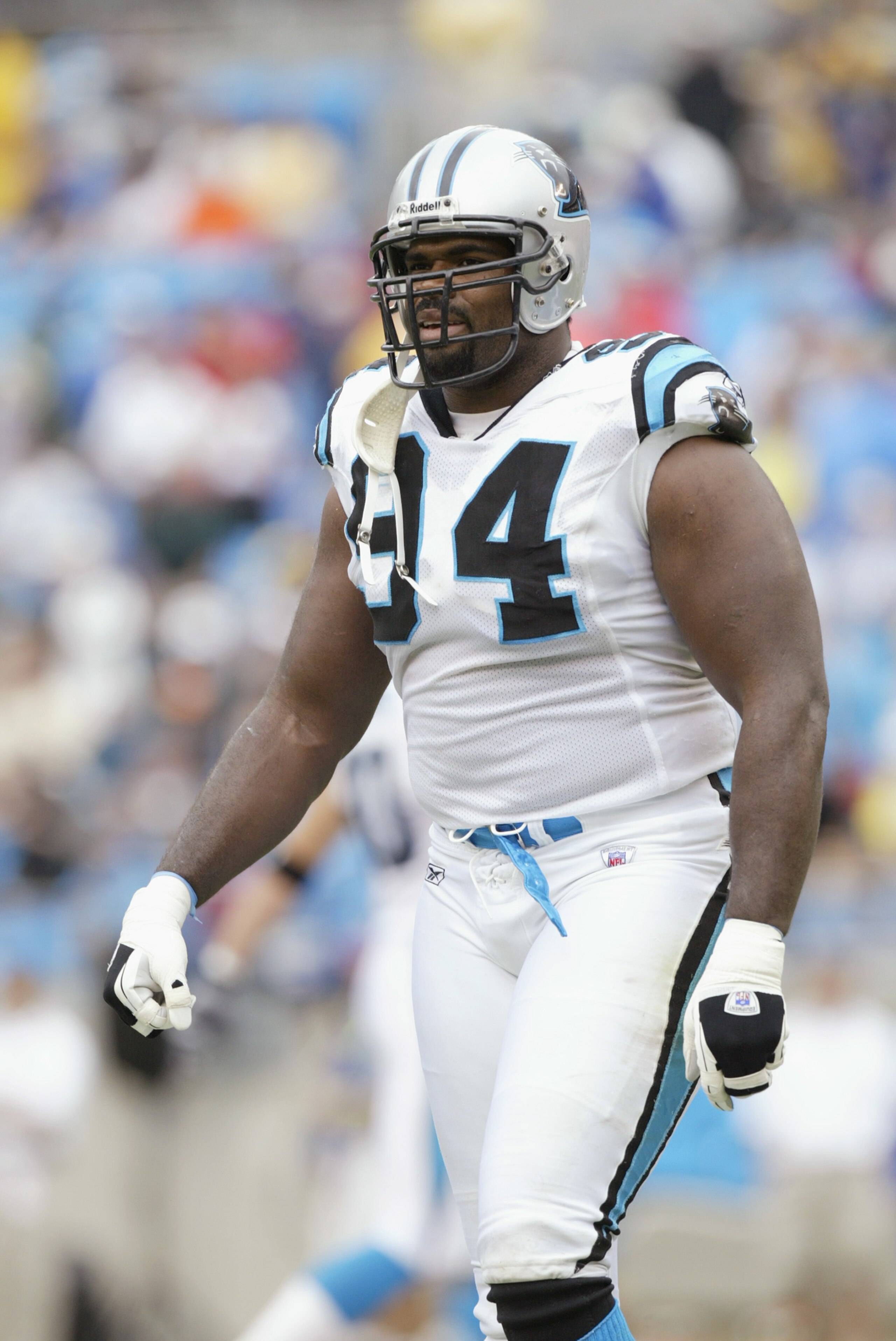 CHARLOTTE, NC - SEPTEMBER 15:  Defensive tackle Sean Gilbert #94 of the Carolina Panthers walks on the field before the NFL game against the Detroit Lions at Ericsson Stadium on September 15, 2002 in Charlotte, North Carolina. The Panthers won 31-7. (Phot