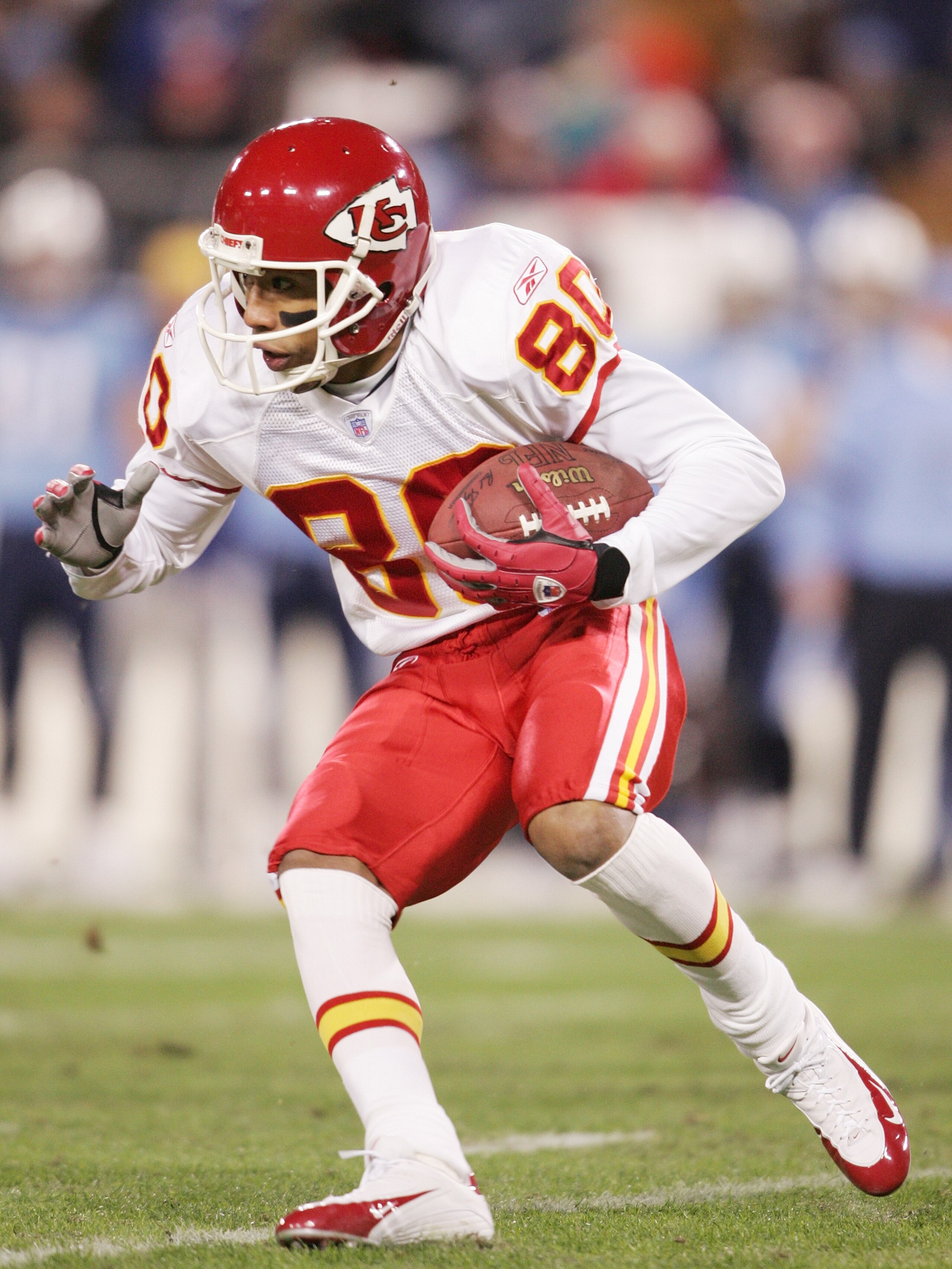 NASHVILLE, TN - DECEMBER 13:  Wide receiver Johnnie Morton #80 of the Kansas City Chiefs carries the ball against the Tennessee Titans during the game at The Coliseum on December 13, 2004 in Nashville, Tennessee.    The Chiefs defeated the Titans 49-38.