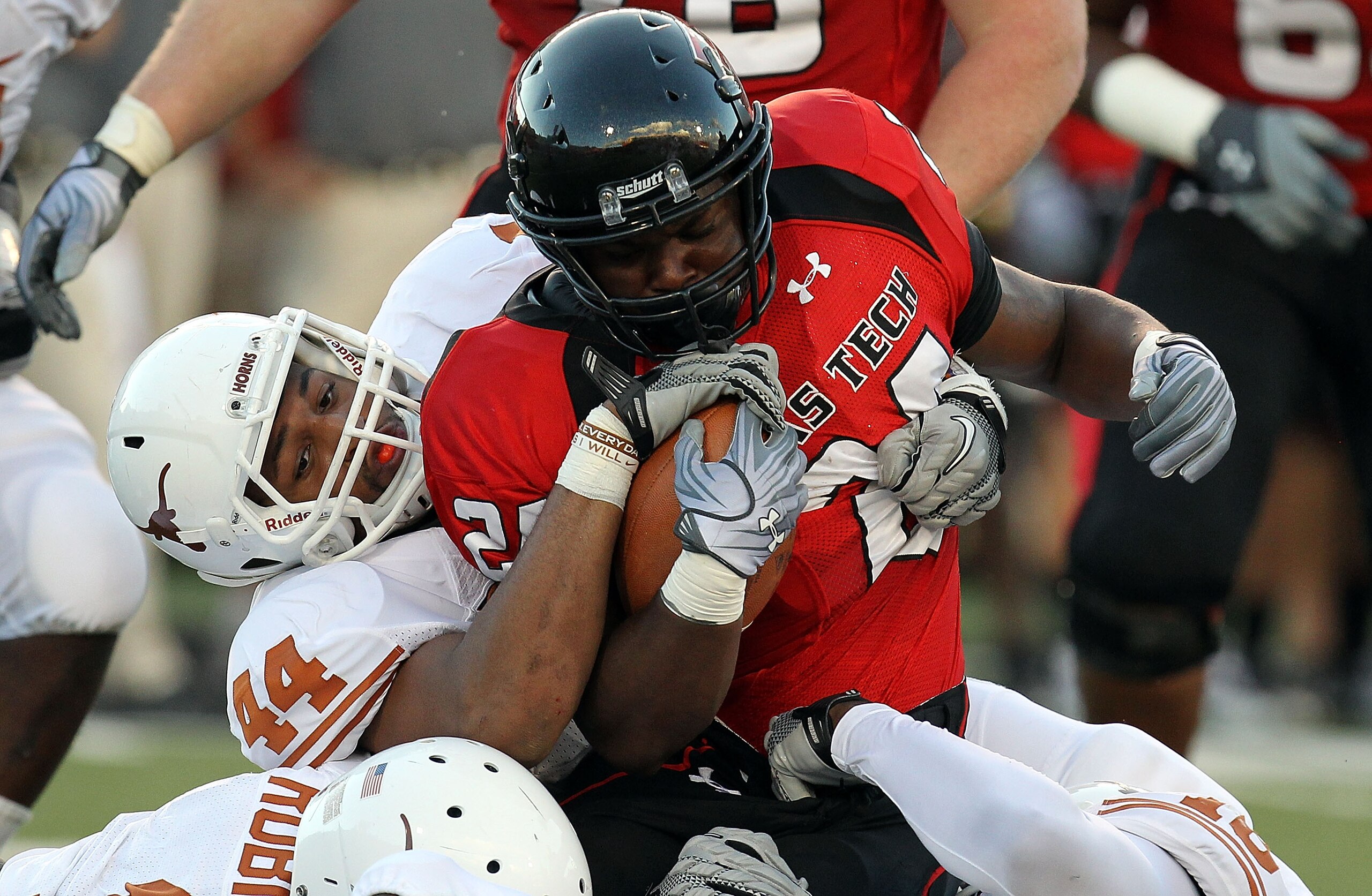 LUBBOCK, TX - SEPTEMBER 18: Running back Eric Stephens #24 of the Texas Tech Red Raiders is tackled by Jackson Jeffcoat #44 of the Texas Longhorns at Jones AT&T Stadium on September 18, 2010 in Lubbock, Texas. (Photo by Ronald Martinez/Getty Images) LUBBOCK, TX - SEPTEMBER 18: Running back Eric Stephens #24 of the Texas Tech Red Raiders is tackled by Jackson Jeffcoat #44 of the Texas Longhorns at Jones AT&T Stadium on September 18, 2010 in Lubbock, Texas. (Photo by Ronald Martinez/Getty Images)