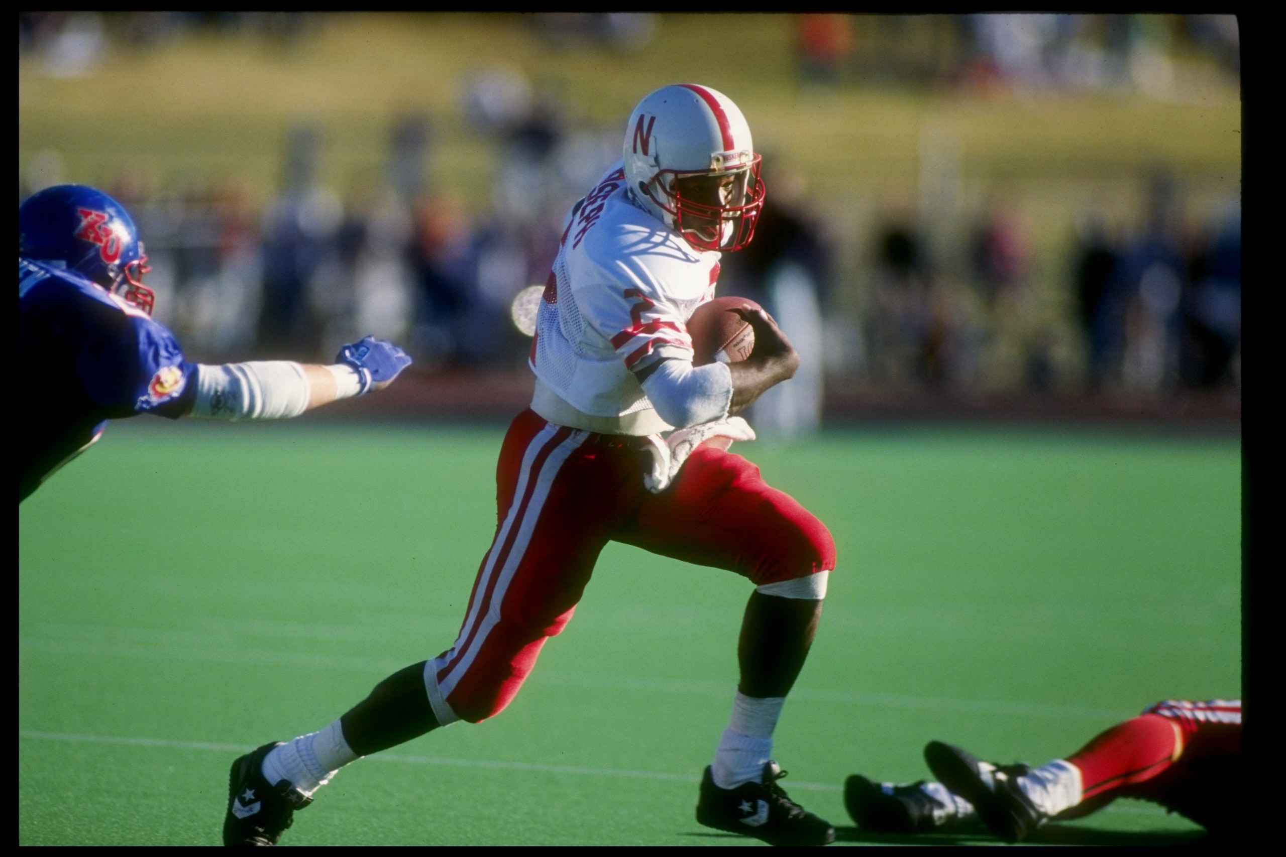 10 Nov 1990: Mickey Joseph of the Nebraska Cornhuskers runs with the ball during a game against the Kansas Jayhawks. Nebraska won the game 41-9. Mandatory Credit: Tim de Frisco /Allsport 10 Nov 1990: Mickey Joseph of the Nebraska Cornhuskers runs with the ball during a game against the Kansas Jayhawks. Nebraska won the game 41-9. Mandatory Credit: Tim de Frisco /Allsport