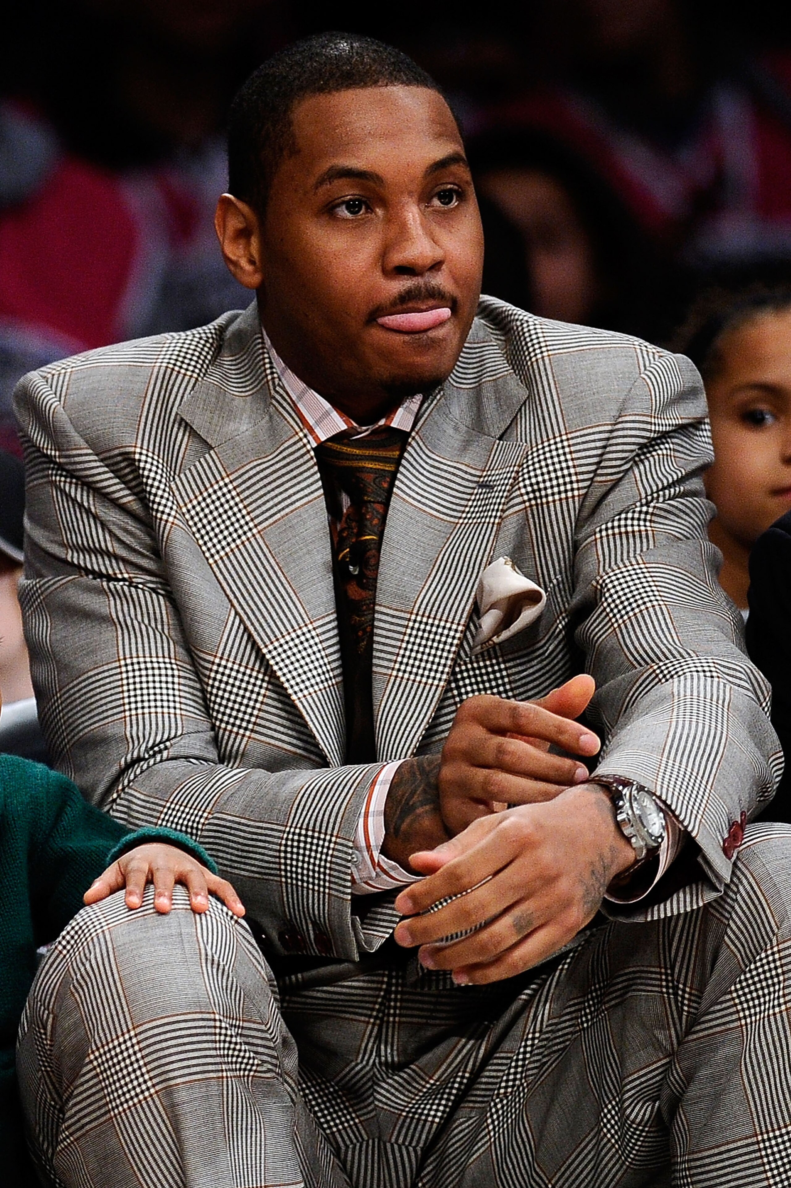 LOS ANGELES, CA - FEBRUARY 18:  Carmelo Anthony of the Denver Nuggets watches the T-Mobile Rookie Challenge and Youth Jam at Staples Center on February 18, 2011 in Los Angeles, California.  (Photo by Kevork Djansezian/Getty Images)