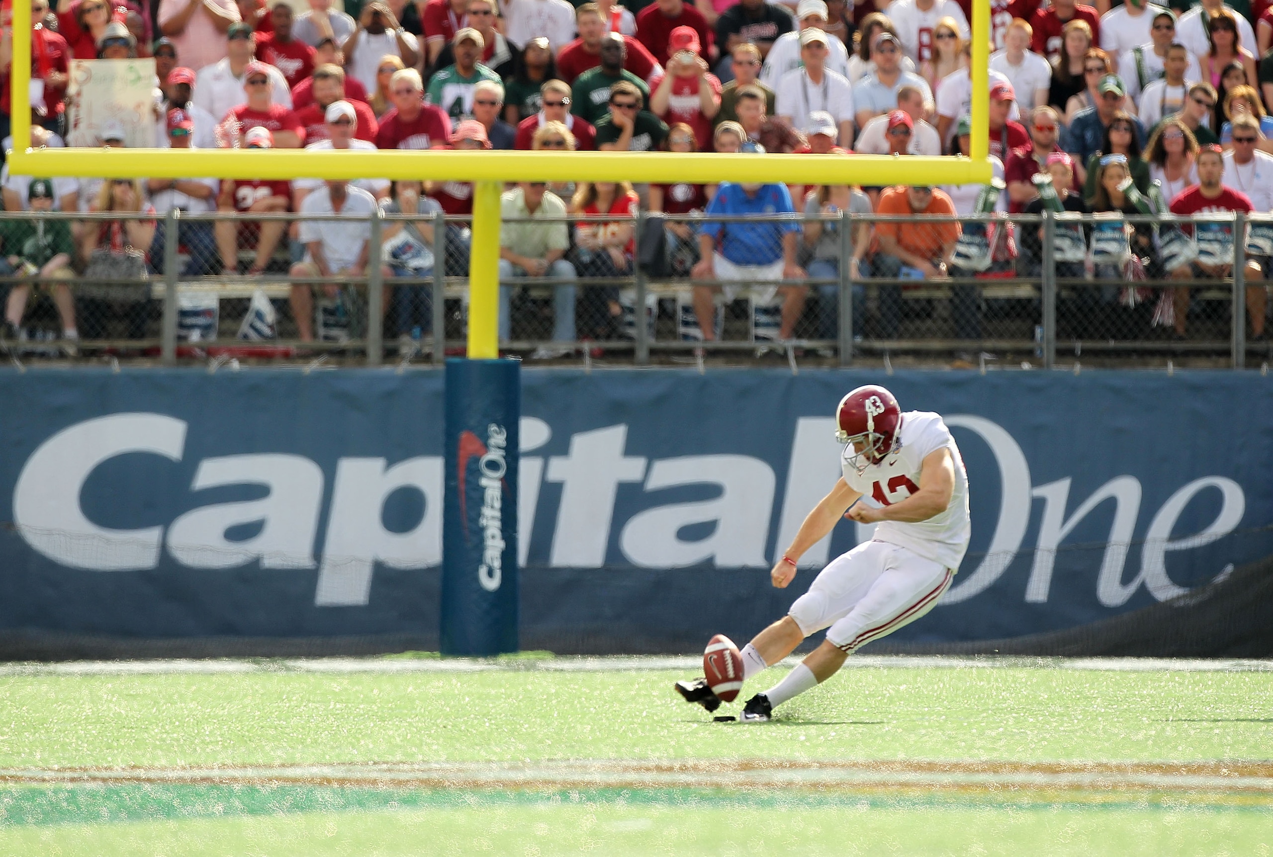 ORLANDO, FL - JANUARY 01: Cade Foster #43 of the Alabama Crimson Tide kicks off during the Capitol One Bowl against the Michigan State Spartans at the Florida Citrus Bowl on January 1, 2011 in Orlando, Florida.  (Photo by Mike Ehrmann/Getty Images)