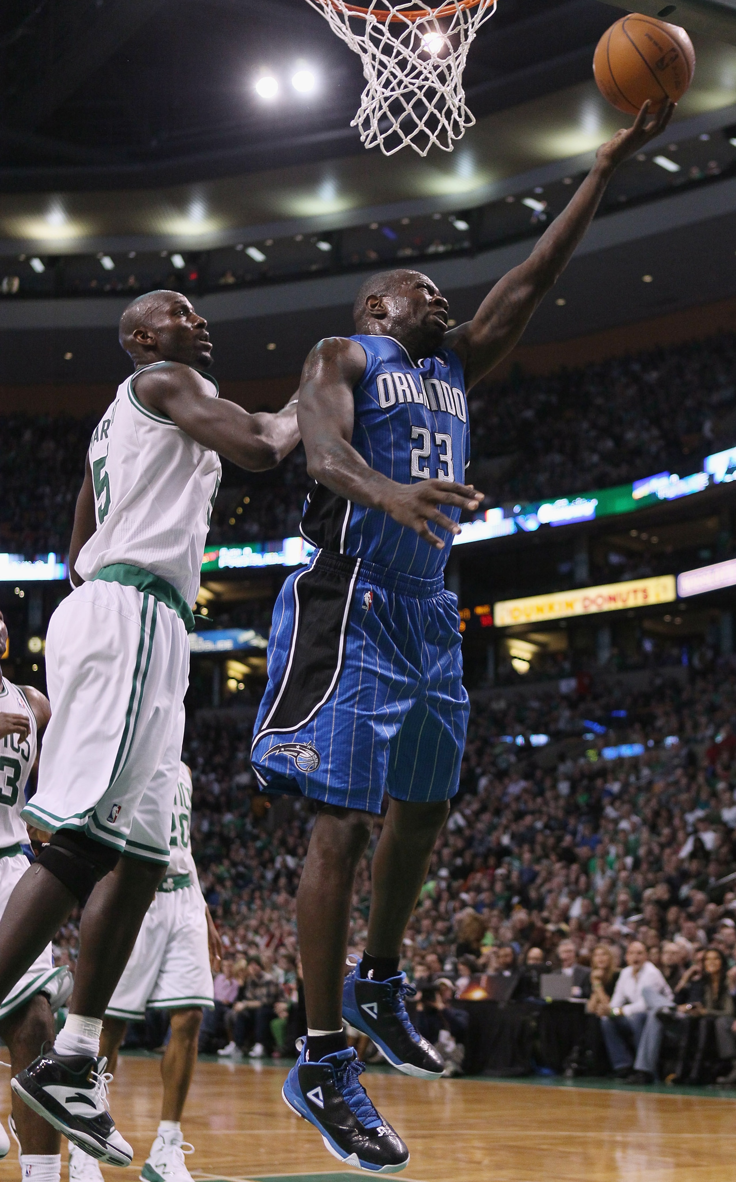 BOSTON, MA - FEBRUARY 06:  Jason Richardson #23 of the Orlando Magic takes a shot as Kevin Garnett #5 of the Boston Celtics defends on February 6, 2011 at the TD Garden in Boston, Massachusetts. The Celtics defeated the Magic 91-80. NOTE TO USER: User exp
