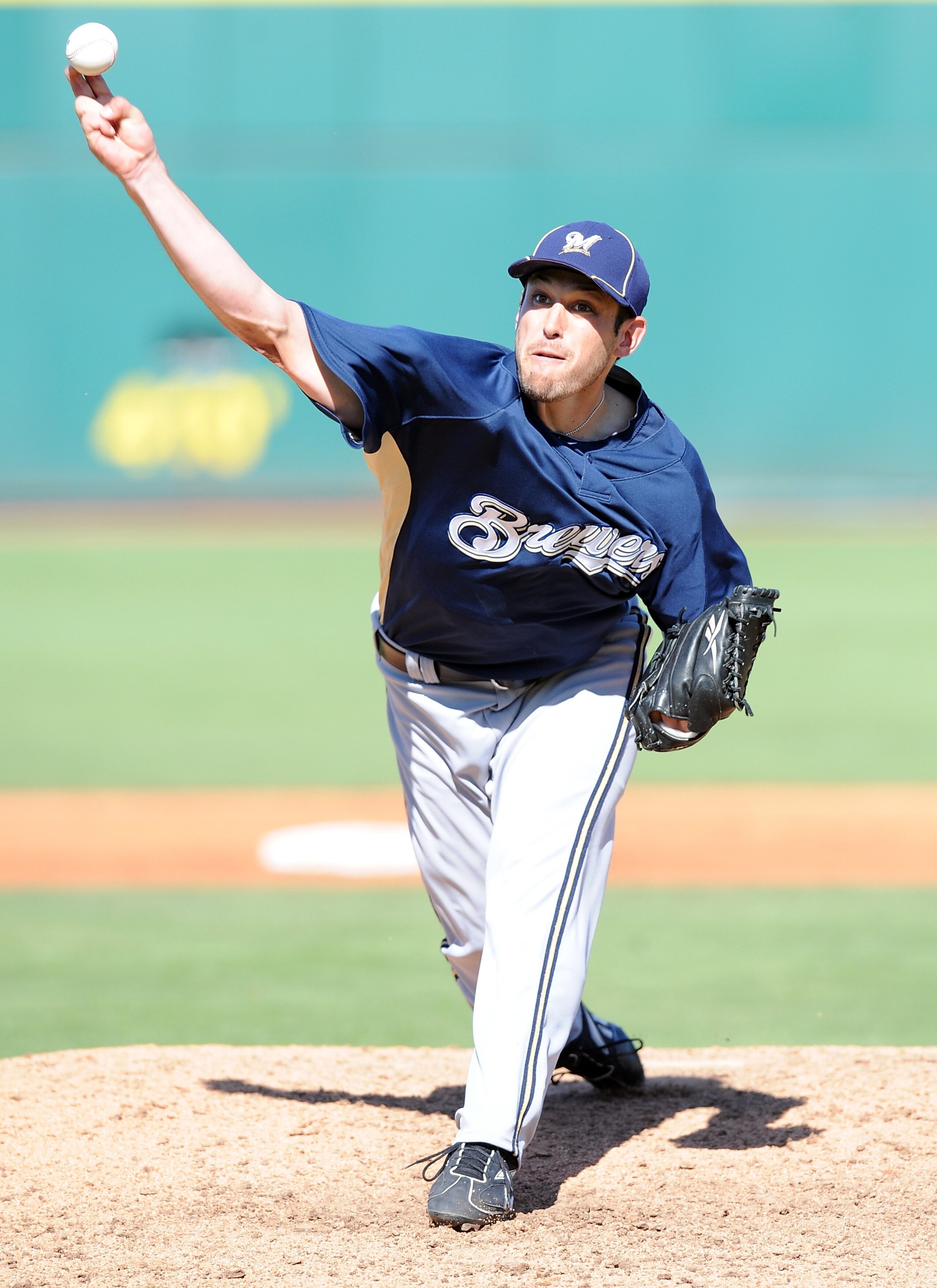 GOODYEAR, AZ - MARCH 11:  Mark Rogers #64 of the Milwaukee Brewers pitches during a Spring Training game against the Cincinnati Reds on March 11, 2010 at Goodyear Ballpark in Goodyear, Arizona.  (Photo by Lisa Blumenfeld/Getty Images)