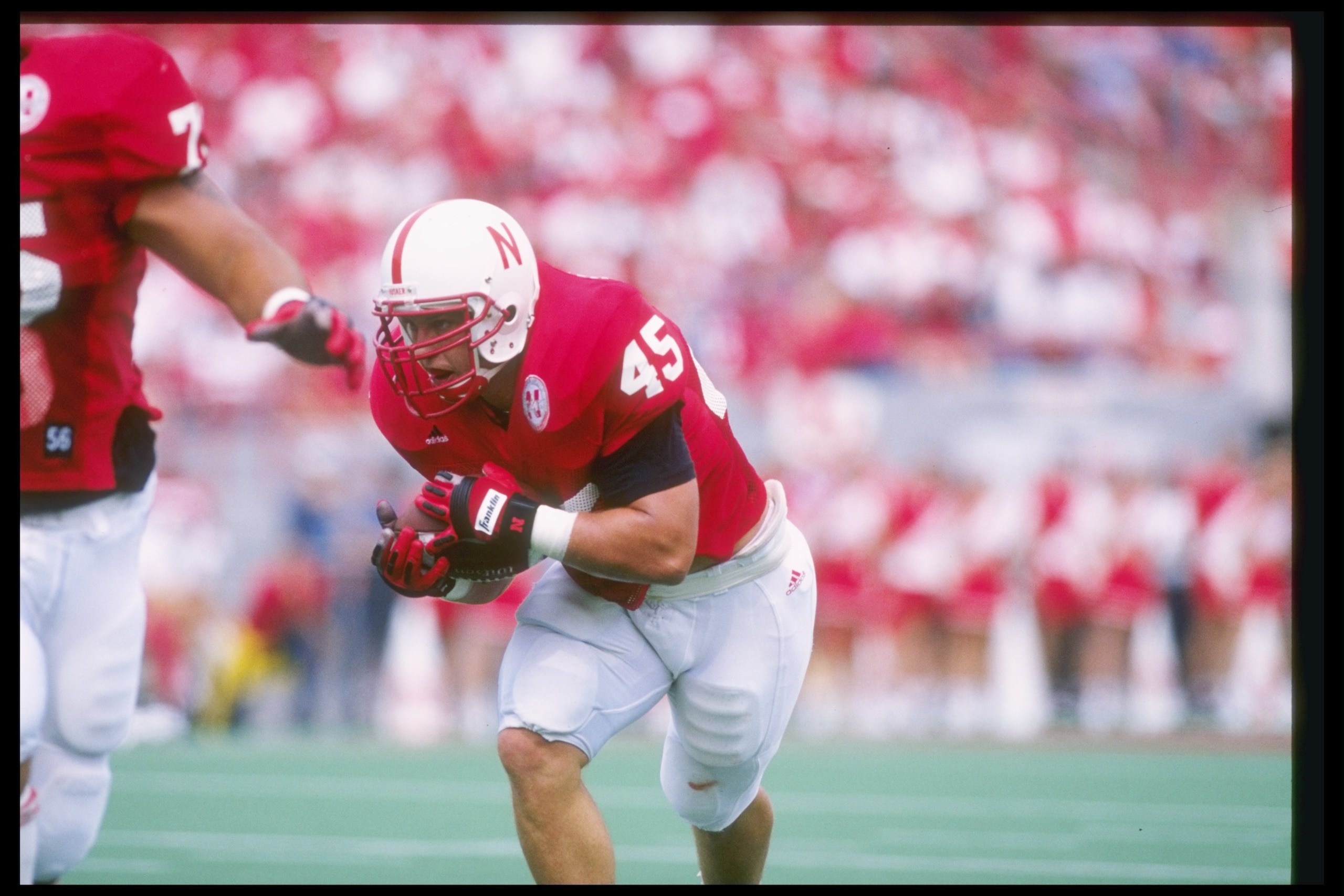 7 Sep 1996: Fullback Joel Mackovicka (right) and guard Chris Dishman of the Nebraska Cornhuskers in action during a game against the Michigan State Spartans at Memorial Stadium in Lincoln, Nebraska. Nebraska won the game 55-14. Mandatory Credit: Stephen 7 Sep 1996: Fullback Joel Mackovicka (right) and guard Chris Dishman of the Nebraska Cornhuskers in action during a game against the Michigan State Spartans at Memorial Stadium in Lincoln, Nebraska. Nebraska won the game 55-14. Mandatory Credit: Stephen