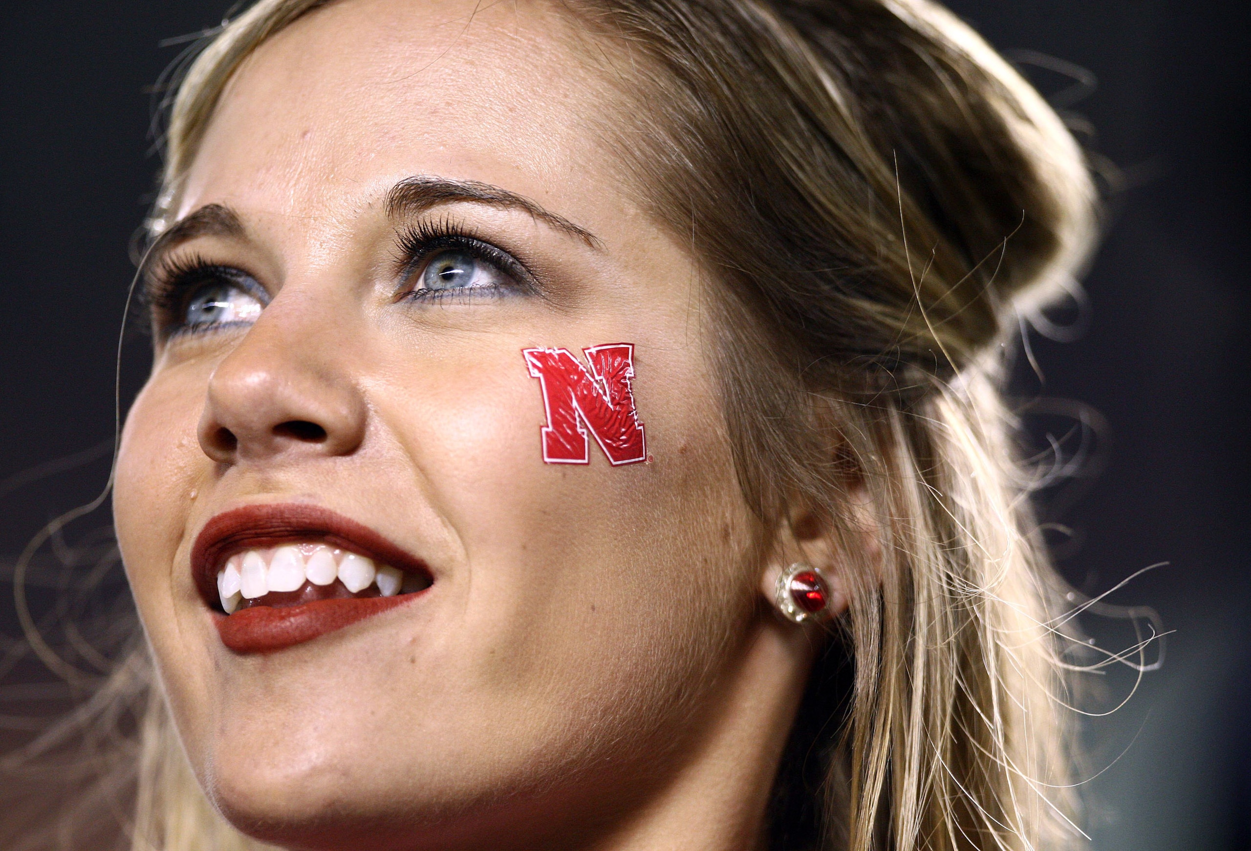 SAN DIEGO, CA - DECEMBER 30: A University of Nebraska Cornhuskers cheerleader looks on against the University of Arizona Wildcats during the Pacific Life Holiday Bowl, on December 30, 2009 at Qualcomm Stadium in San Diego, California. (Photo By Donald Mi SAN DIEGO, CA - DECEMBER 30: A University of Nebraska Cornhuskers cheerleader looks on against the University of Arizona Wildcats during the Pacific Life Holiday Bowl, on December 30, 2009 at Qualcomm Stadium in San Diego, California. (Photo By Donald Mi