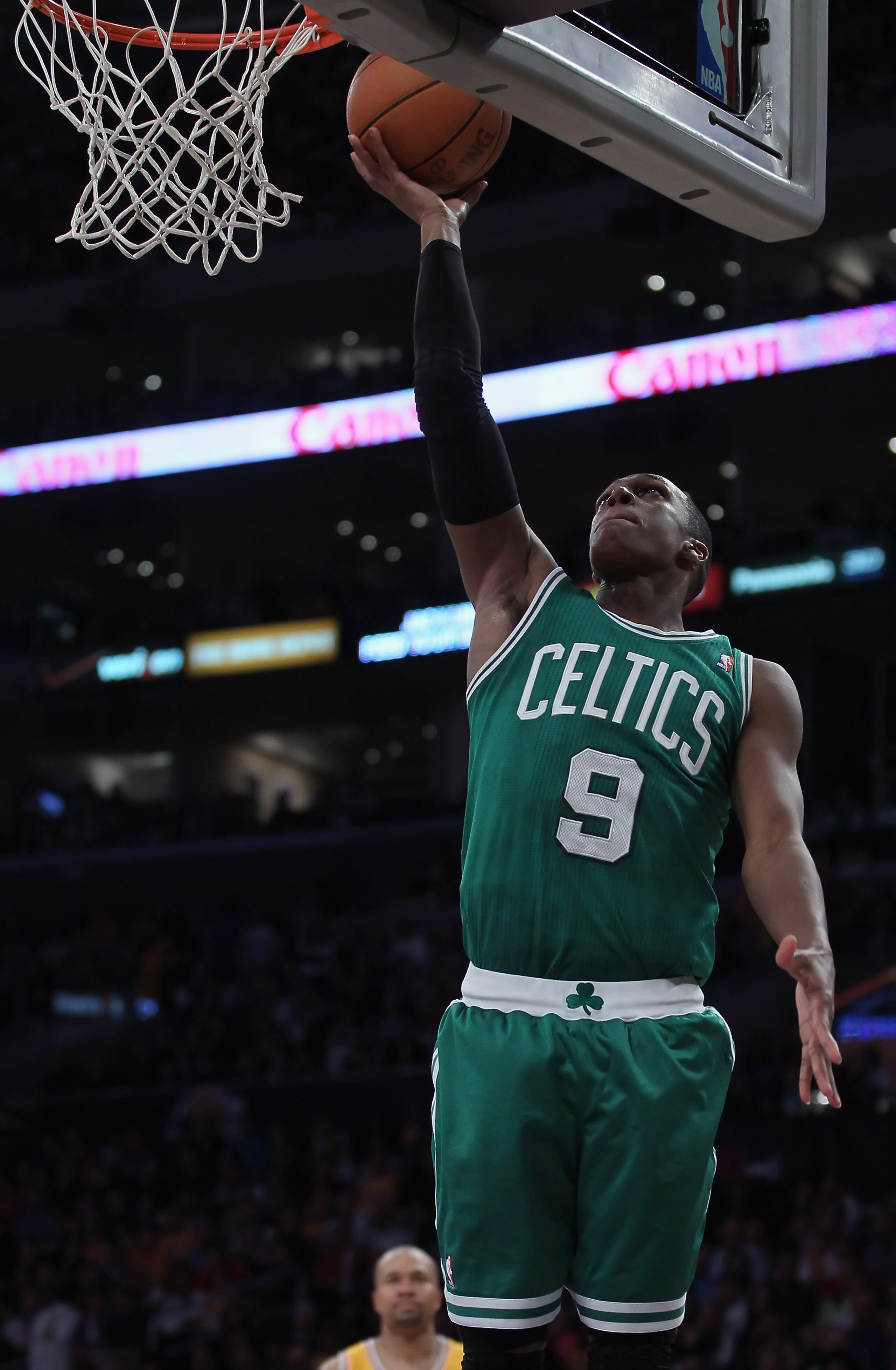 LOS ANGELES, CA - JANUARY 30:  Rajon Rondo #9 of the Boston Celtics drives to the basket for a layup against the Los Angeles Lakers in the second half at Staples Center on January 30, 2011 in Los Angeles, California. The Celtics defeated the Lakers 109-96