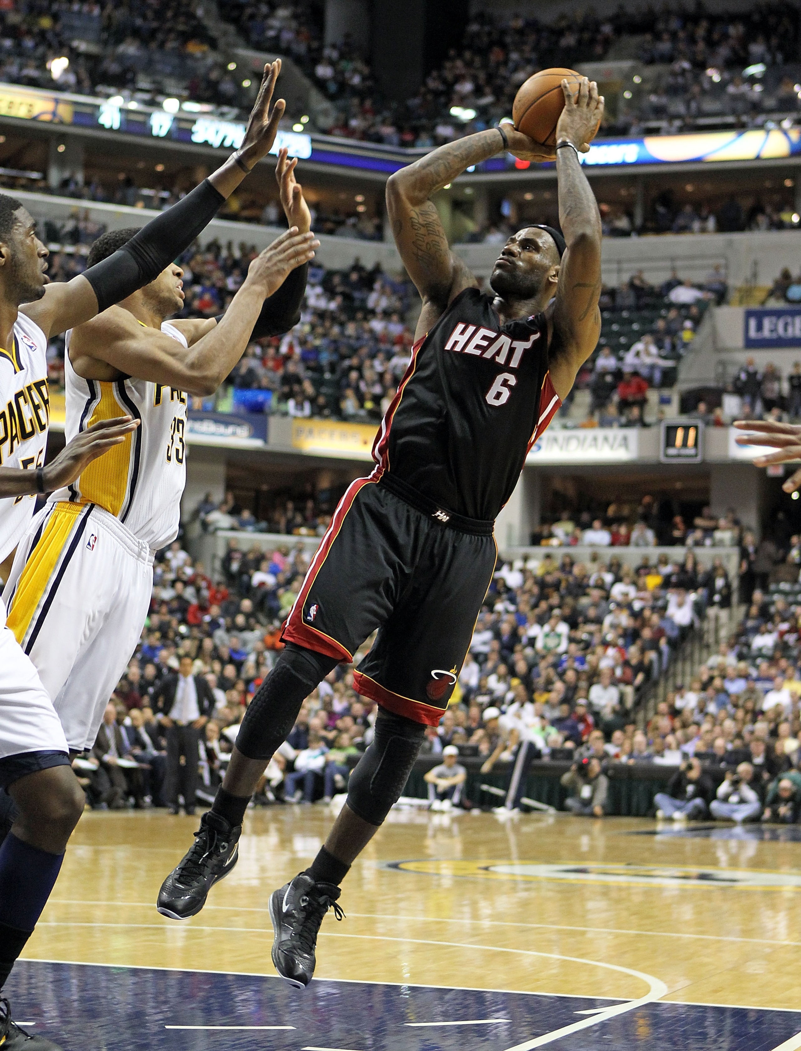 INDIANAPOLIS - FEBRUARY 15:  LeBron James #6 of the Miami Heat shoots the ball during the NBA game against the Indiana Pacers at Conseco Fieldhouse on February 15, 2011 in Indianapolis, Indiana.   The Heat won 110-103.   NOTE TO USER: User expressly ackno
