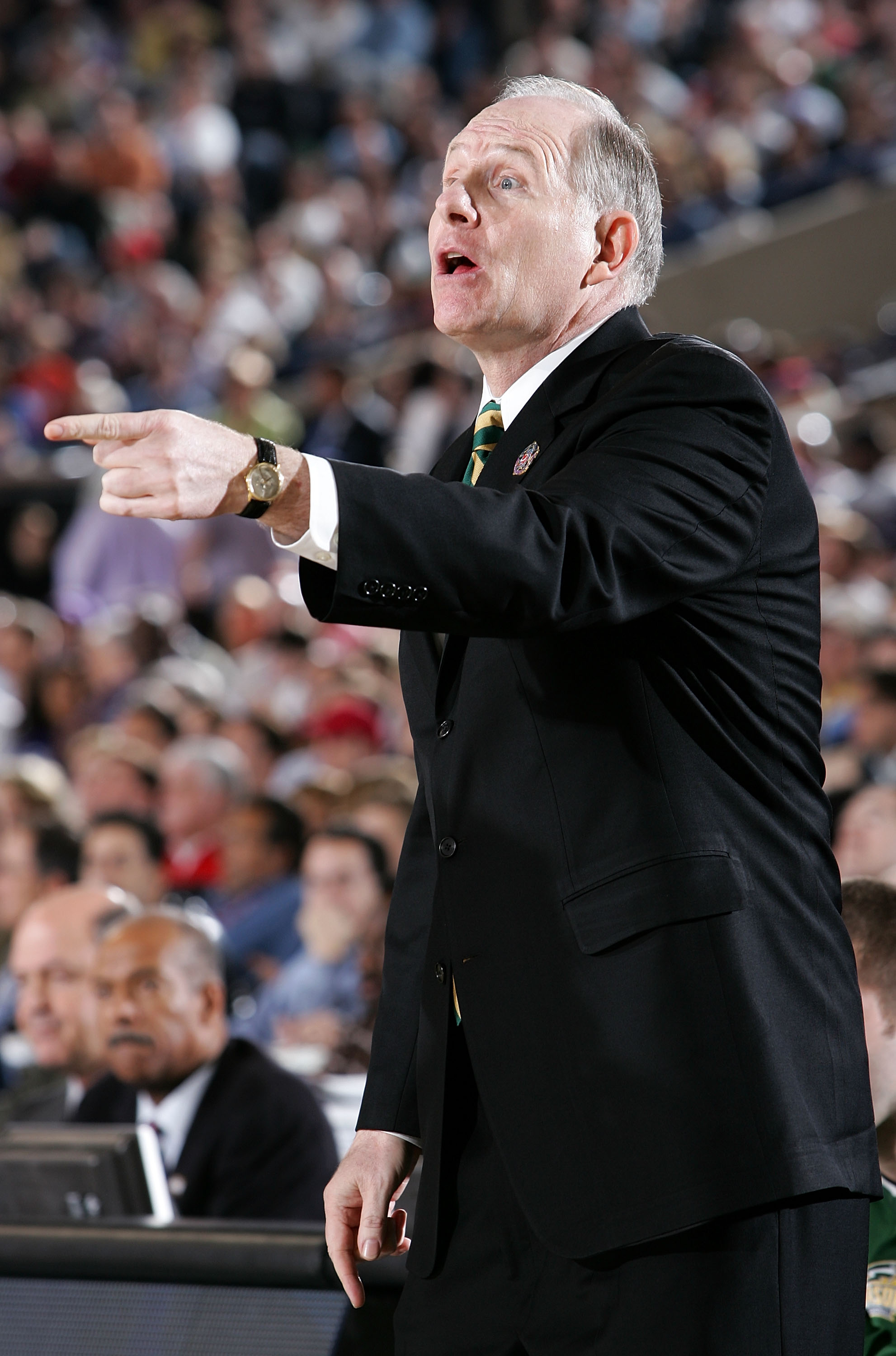 INDIANAPOLIS - APRIL 01: Head coach Jim Larranaga of the George Mason Patriots points against the Florida Gators during the semifinal game of the NCAA Men's Final Four on April 1, 2006 at the RCA Dome in Indianapolis, Indiana. The Gators defeated the Patr