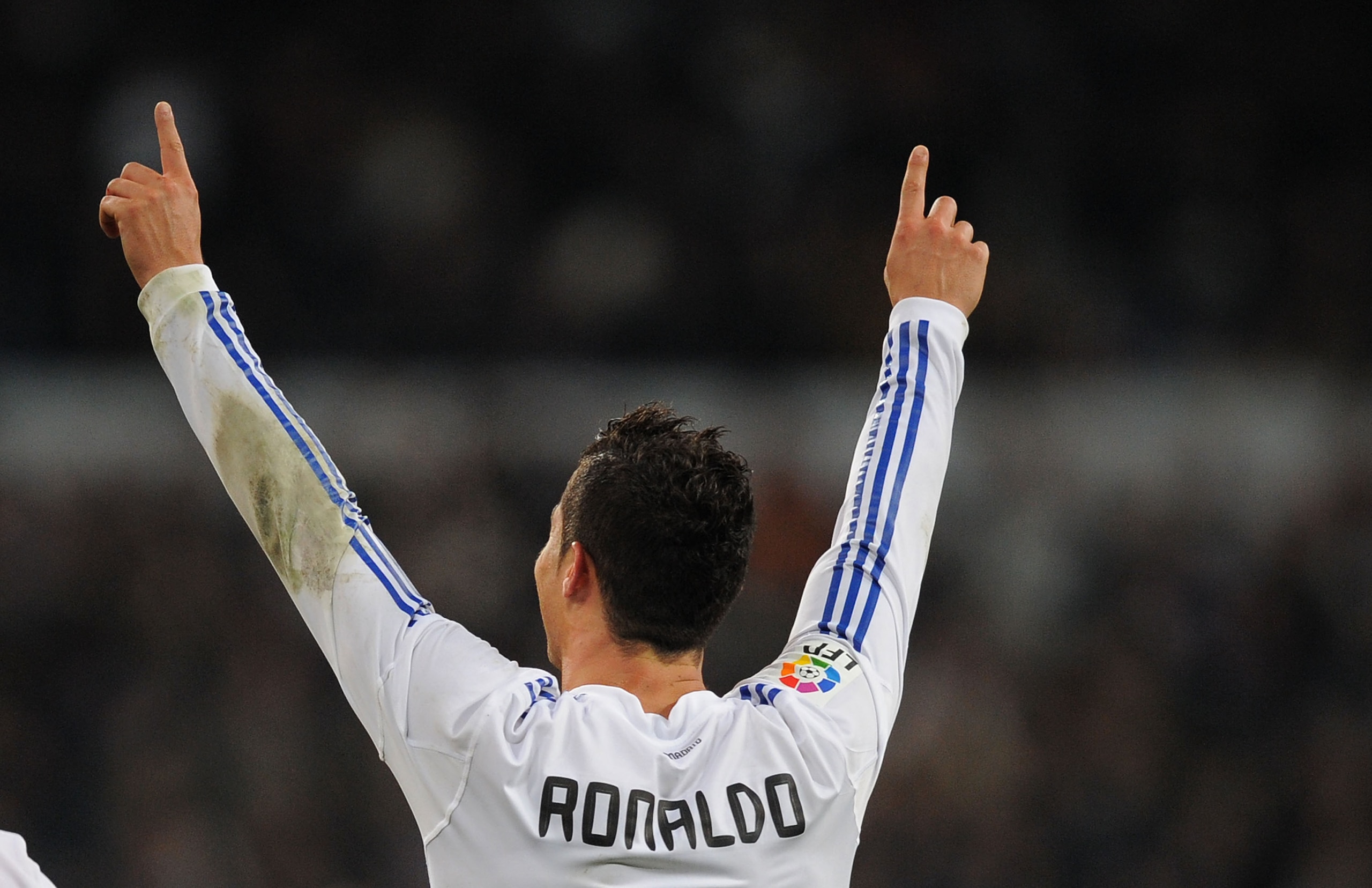 MADRID, SPAIN - JANUARY 09: Cristiano Ronaldo of Real Madrid celebrates after scoring Real's third goal during the La Liga match between Real Madrid and Villarreal at Estadio Santiago Bernabeu on January 9, 2011 in Madrid, Spain. (Photo by Denis Doyle/ MADRID, SPAIN - JANUARY 09: Cristiano Ronaldo of Real Madrid celebrates after scoring Real's third goal during the La Liga match between Real Madrid and Villarreal at Estadio Santiago Bernabeu on January 9, 2011 in Madrid, Spain. (Photo by Denis Doyle/