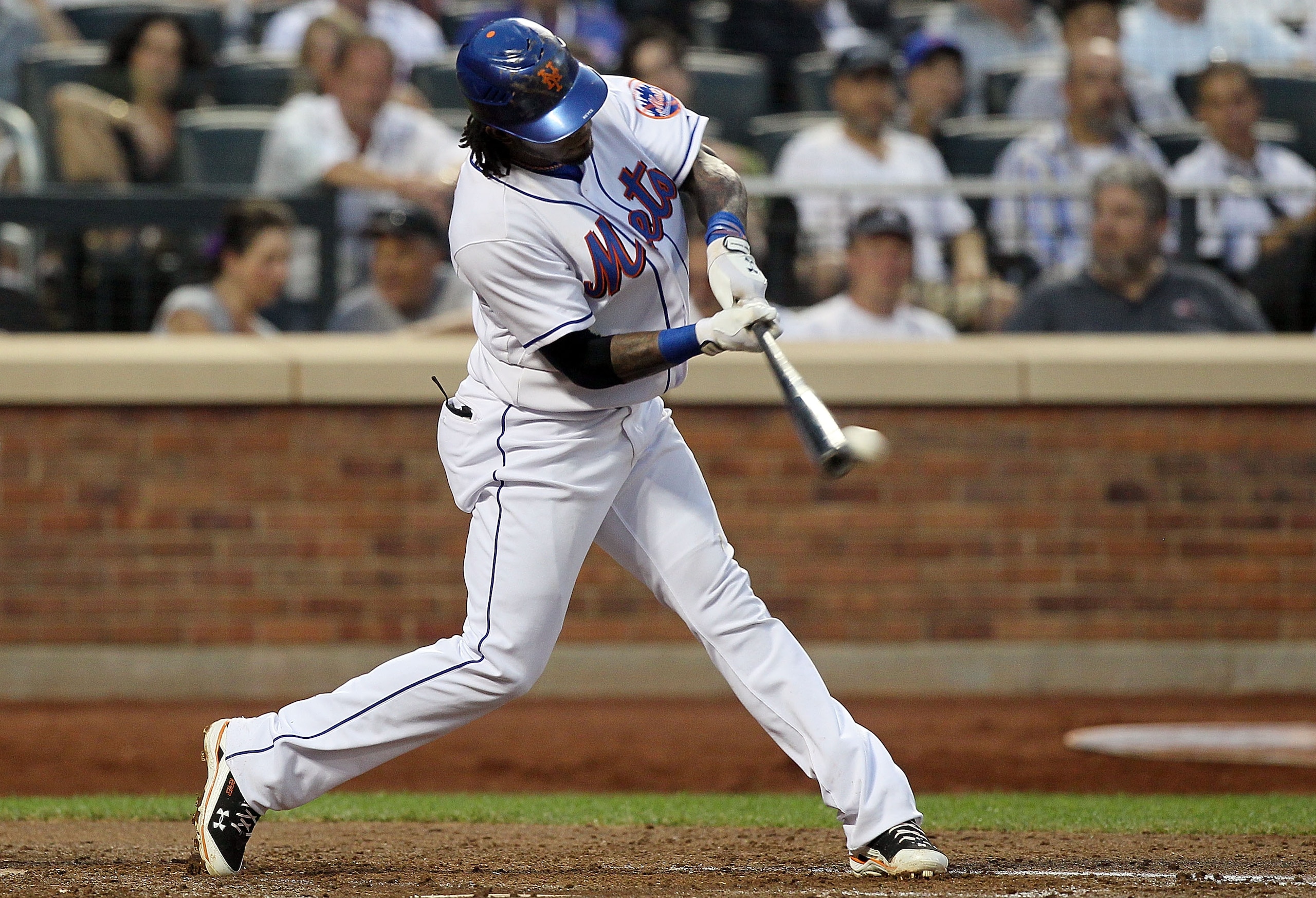 NEW YORK - JULY 07:  Jose Reyes #7 of the New York Mets bats against the Cincinnati Reds on July 7, 2010 at Citi Field in the Flushing neighborhood of the Queens borough of New York City. The Reds defeated the Mets 3-1.  (Photo by Jim McIsaac/Getty Images