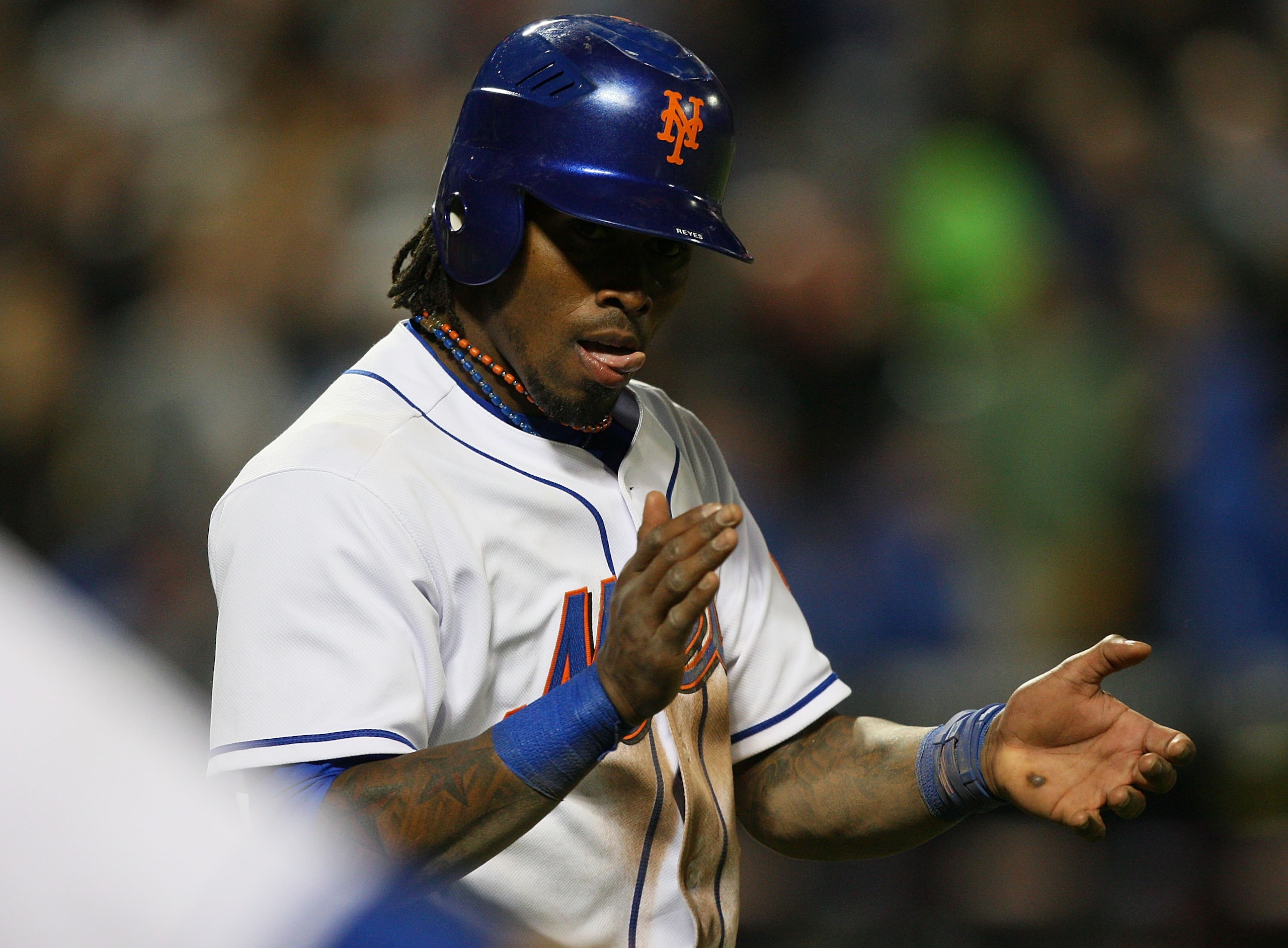 NEW YORK - APRIL 23:  Jose Reyes #7 of the New York Mets celebrates after scoring on Jason Bay's (not shown) triple in the sixth inning triple against the Atlanta Braves on April 23, 2010 at Citi Field in the Flushing neighborhood of the Queens borough of
