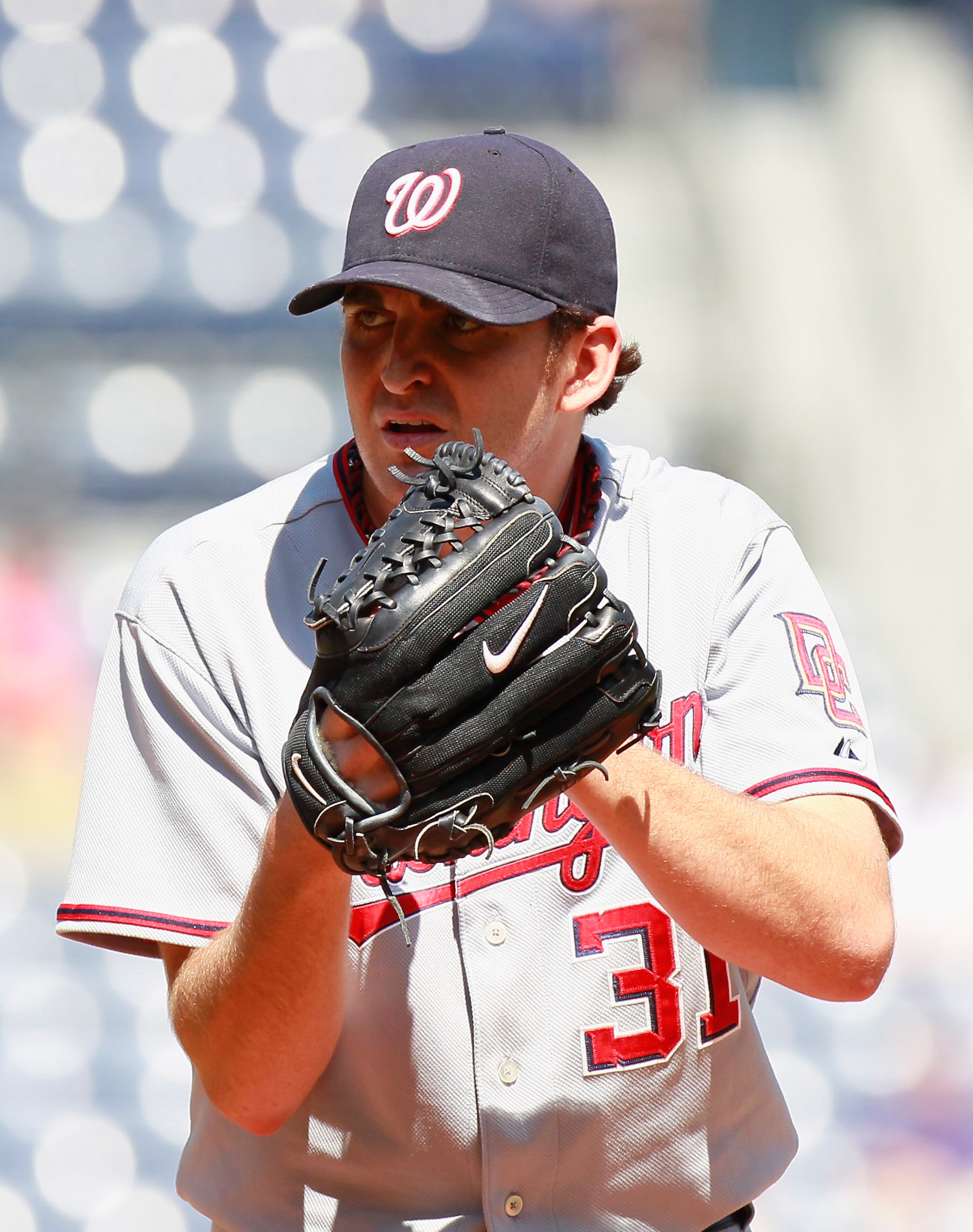 ATLANTA - SEPTEMBER 15:  Starting pitcher John Lannan #31 of the Washington Nationals pitches against the Atlanta Braves at Turner Field on September 15, 2010 in Atlanta, Georgia.  (Photo by Kevin C. Cox/Getty Images)