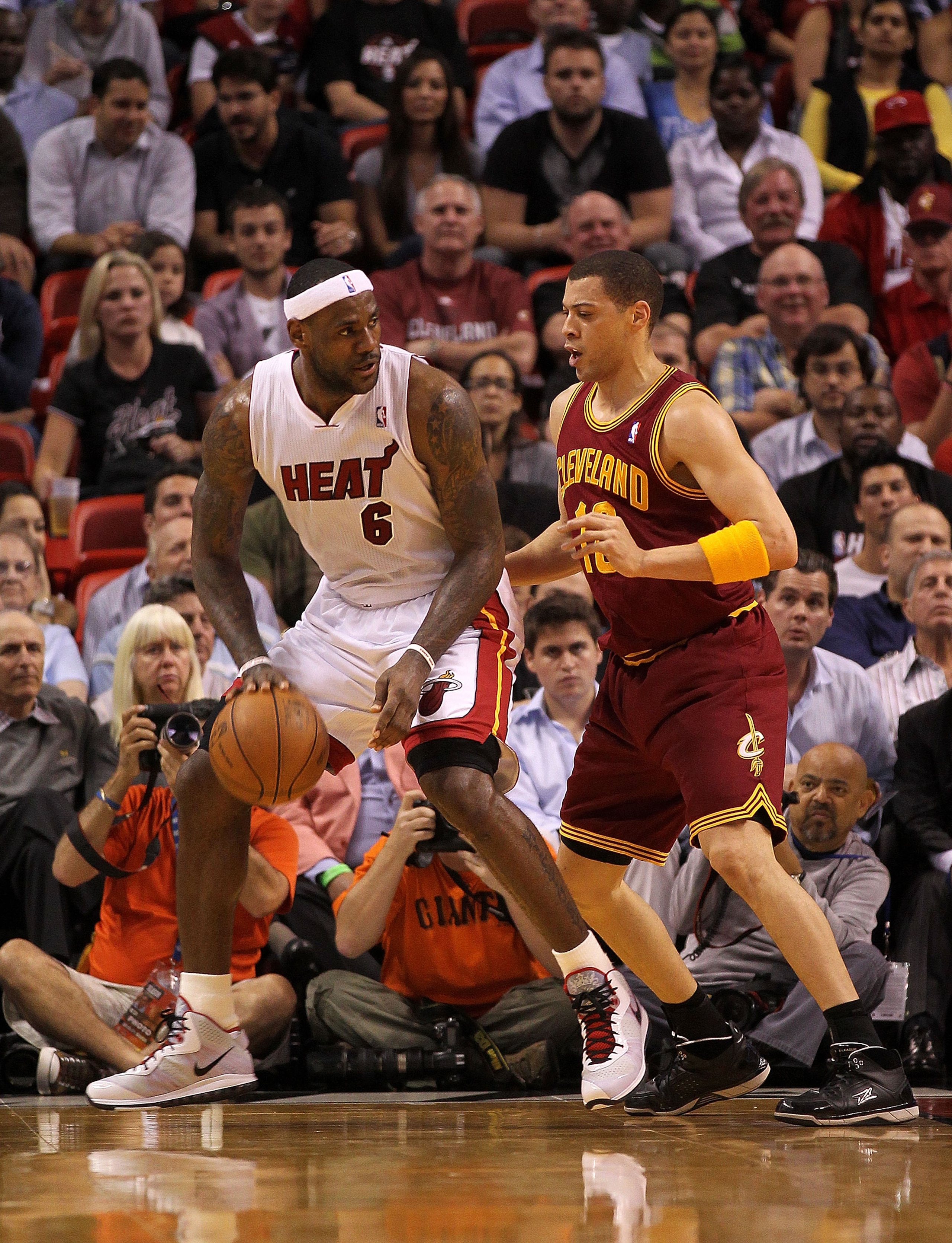 MIAMI, FL - JANUARY 31: LeBron James #6 of the Miami Heat posts up Anthony Parker #18 of the Cleveland Cavaliers during a game at American Airlines Arena on January 31, 2011 in Miami, Florida. NOTE TO USER: User expressly acknowledges and agrees that, by MIAMI, FL - JANUARY 31: LeBron James #6 of the Miami Heat posts up Anthony Parker #18 of the Cleveland Cavaliers during a game at American Airlines Arena on January 31, 2011 in Miami, Florida. NOTE TO USER: User expressly acknowledges and agrees that, by