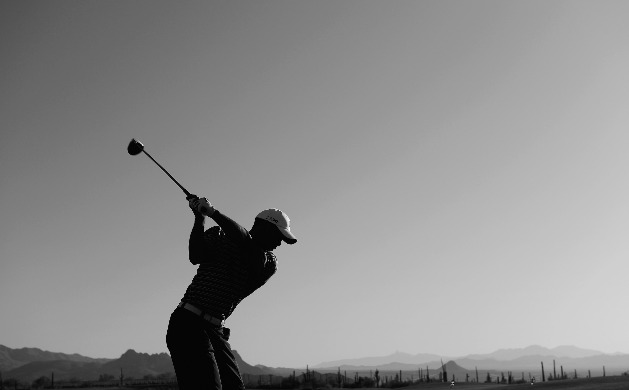 MARANA, AZ - FEBRUARY 22: (EDITORS NOTE: THIS BLACK AND WHITE IMAGE WAS CREATED FROM ORIGINAL COLOUR FILE). Tiger Woods hits a shot on the driving range during practice prior to the start of the World Golf Championships-Accenture Match Play Championship h MARANA, AZ - FEBRUARY 22: (EDITORS NOTE: THIS BLACK AND WHITE IMAGE WAS CREATED FROM ORIGINAL COLOUR FILE). Tiger Woods hits a shot on the driving range during practice prior to the start of the World Golf Championships-Accenture Match Play Championship h