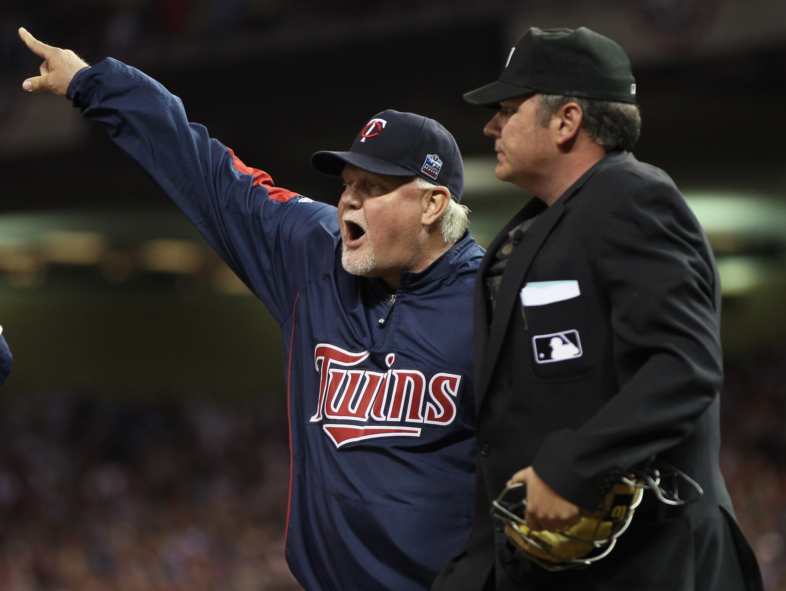 MINNEAPOLIS - OCTOBER 07:  Manager Ron Gardenhire #35 of the Minnesota Twins is ejected from the game by Hunter Wedelstedt in the seventh inning against the New York Yankees during game two of the ALDS on October 7, 2010 at Target Field in Minneapolis, Mi