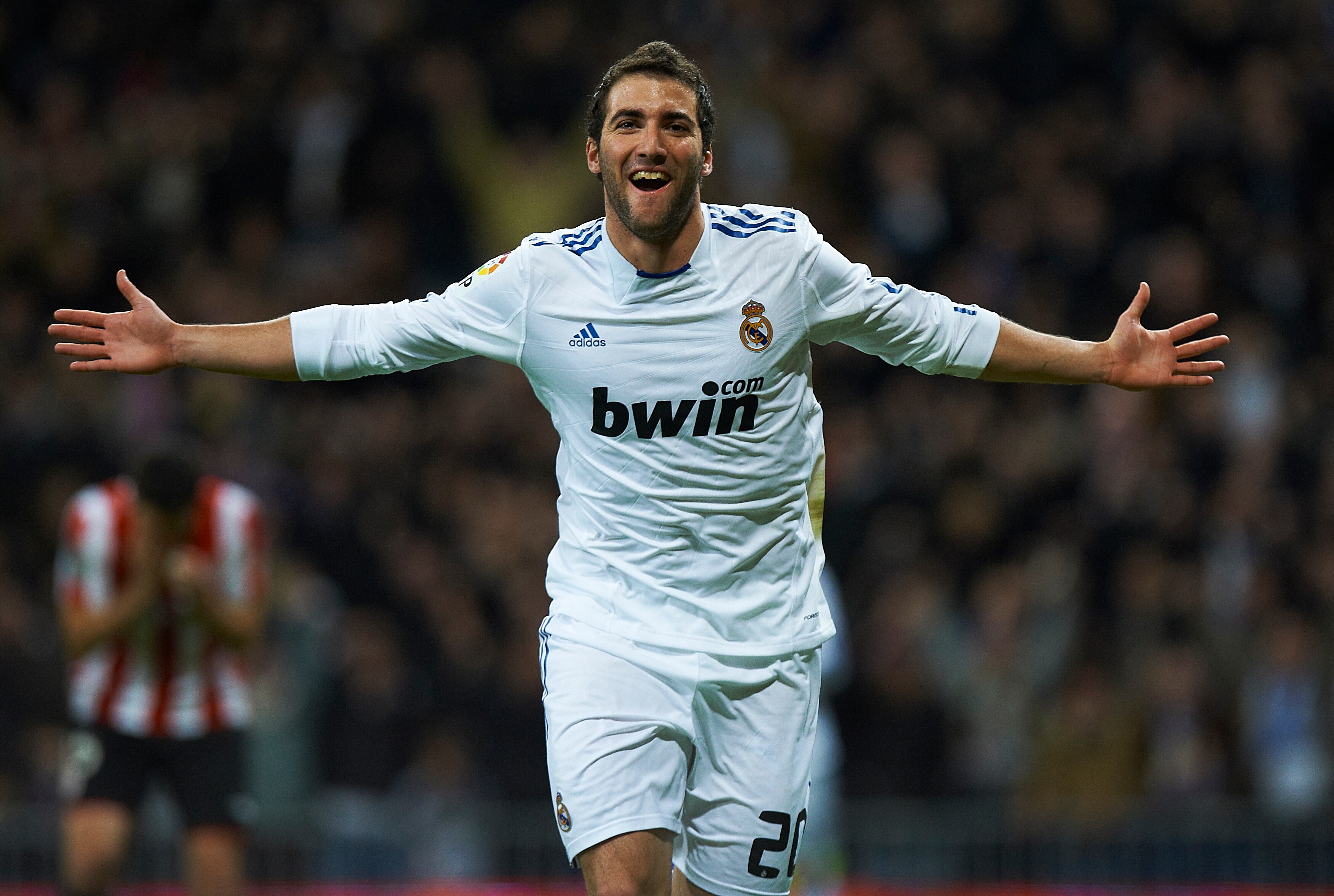 MADRID, SPAIN - NOVEMBER 20:  Gonzalo Higuain of Real Madrid celebrates after scoring the 1-0 during the la liga match between Real Madrid and Athletic Bilbao at Estadio Santiago Bernabeu on November 20, 2010 in Madrid, Spain.  (Photo by Manuel Queimadelo