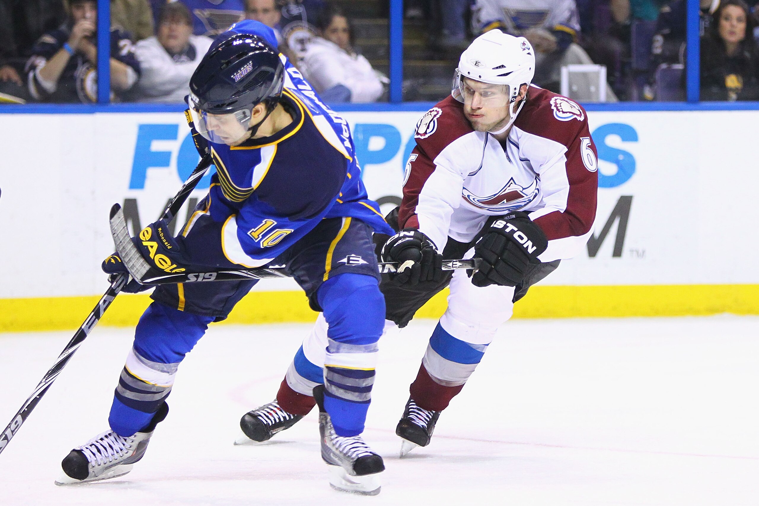 ST. LOUIS, MO - FEBRUARY 22: Eric Johnson #6 of the Colorado Avalanche defends against Andy McDonald #10 of the St. Louis Blues at the Scottrade Center on February 22, 2011 in St. Louis, Missouri. It was Johnson's first game back in St. Louis after being ST. LOUIS, MO - FEBRUARY 22: Eric Johnson #6 of the Colorado Avalanche defends against Andy McDonald #10 of the St. Louis Blues at the Scottrade Center on February 22, 2011 in St. Louis, Missouri. It was Johnson's first game back in St. Louis after being