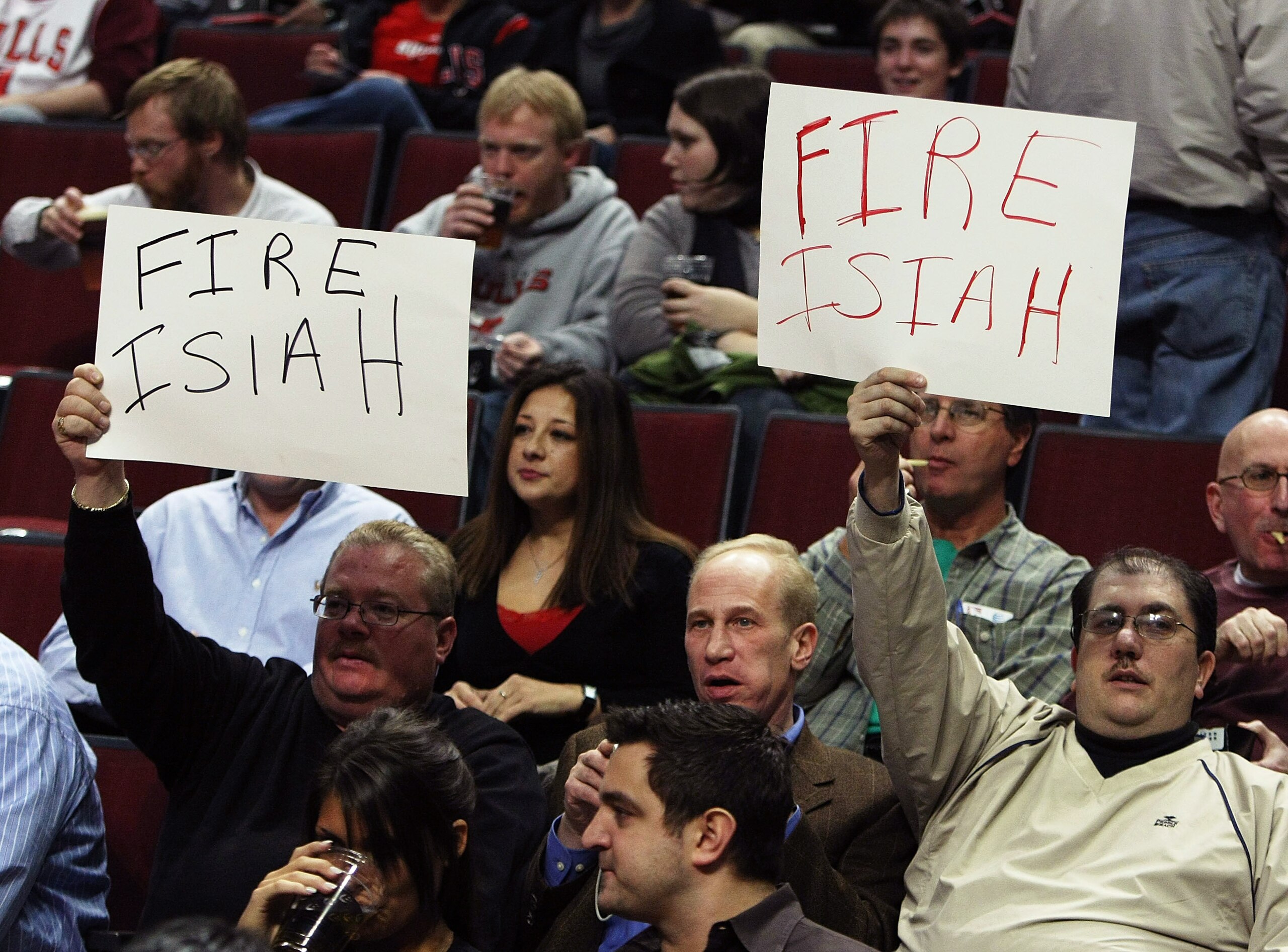 CHICAGO - JANUARY 08: Fans hold up signs reading 'Fire Isiah' before a game between the Chicago Bulls and the New York Knicks on January 8, 2008 at the United Center in Chicago, Illinois. NOTE TO USER: User expressly acknowledges and agreees that, by down